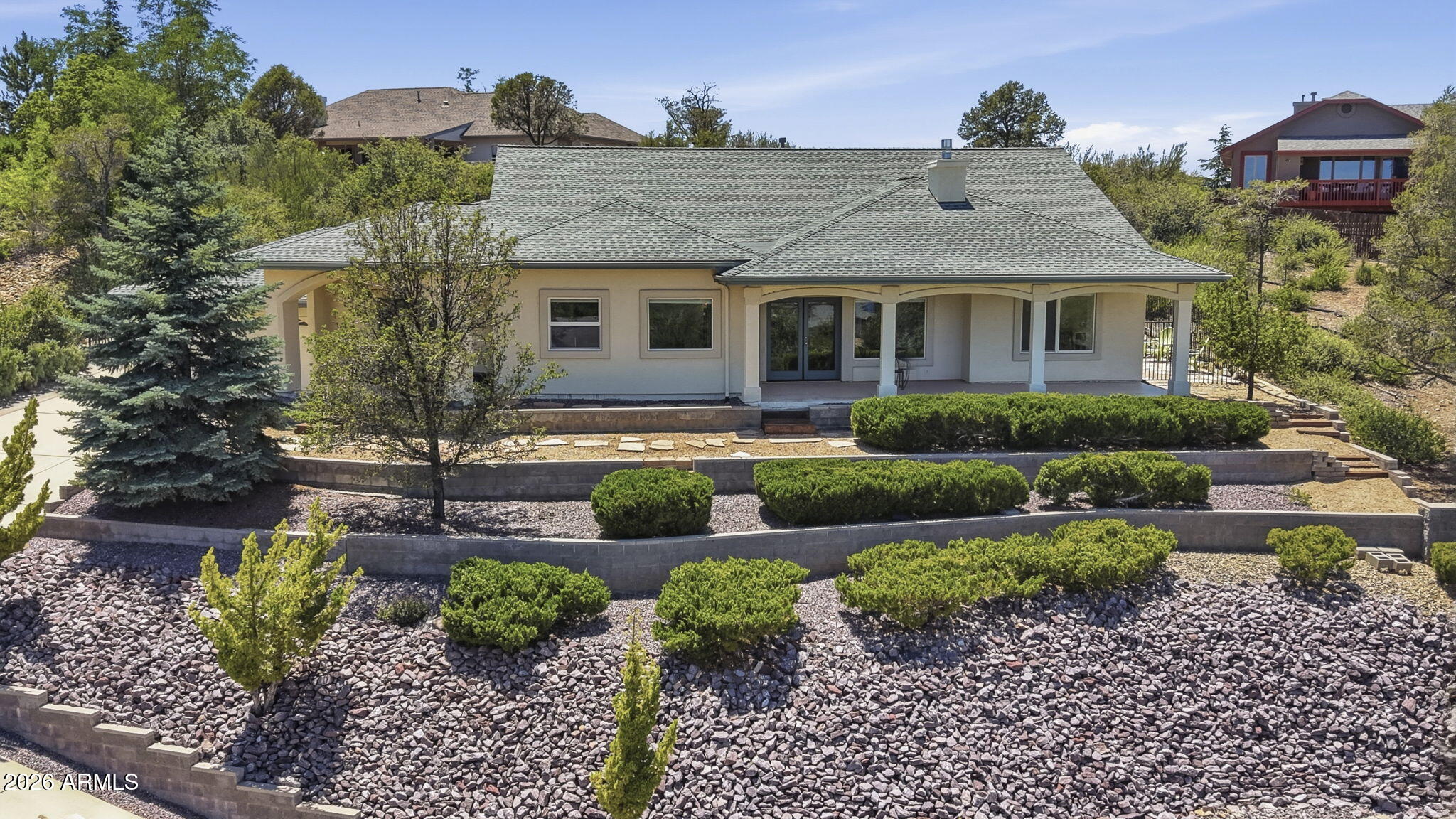 Nestled on a quiet cul-de-sac in sought-after Eagle Ridge, this beautifully maintained single-level home showcases breathtaking panoramic views of Bill Williams Mnts, Mingus Mtn Range, Granite Dells & San Francisco Peaks. Offering appr 2,572 sq ft with 3 bedrooms, 2.5 baths & flexible living spaces, the home blends comfort & functionality. The remodeled kitchen features quarter-sawn oak cabinetry, quartz countertops, Thermador appliances, counter-depth refrigerator, large island, oversized walk-in pantry & picture window framing the spectacular scenery. Engineered oak flooring, custom built-ins, abundant natural light,  gas f/p, dedicated office or hobby room, spacious laundry rm, fenced backyard, apple trees, 2019 kitchen renovation & 2020 GAF 50-year roof warranty.