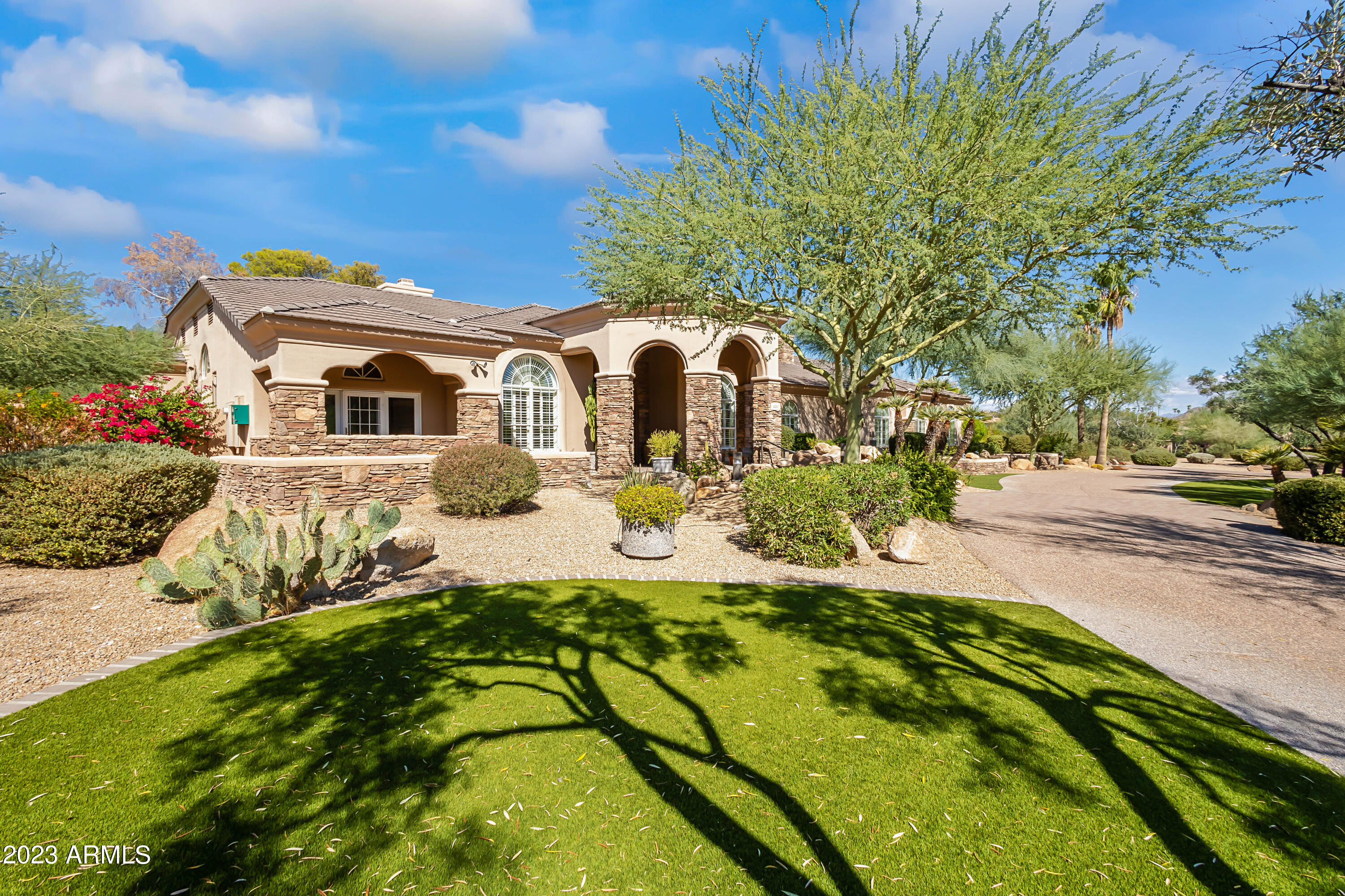 Experience the epitome of luxury living in the exclusive Clearview gated community, nestled in the heart of Paradise Valley. This remarkable residence boasts a spacious split floorplan with breathtaking vistas of Camelback Mountain. With room for up to eight vehicles in the expansive parking court, elegant water fountains gracing the back yard and a private master suite deck offering enchanting Camelback views, this home exudes opulence. Throughout, you'll find exquisite woodwork, with an incredible amount of attic storage. The list of amenities is extensive. Multiple entertainment spaces are perfect for hosting friends and family, while the generous chef's kitchen, formal dining area, and spacious living rooms provide the perfect backdrop for gatherings. This prime location offers easy access to shopping, dining, retail, golf, and the convenience of Sky Harbor Airport, all within a 20-minute drive, making it one of the most coveted addresses in the Valley.