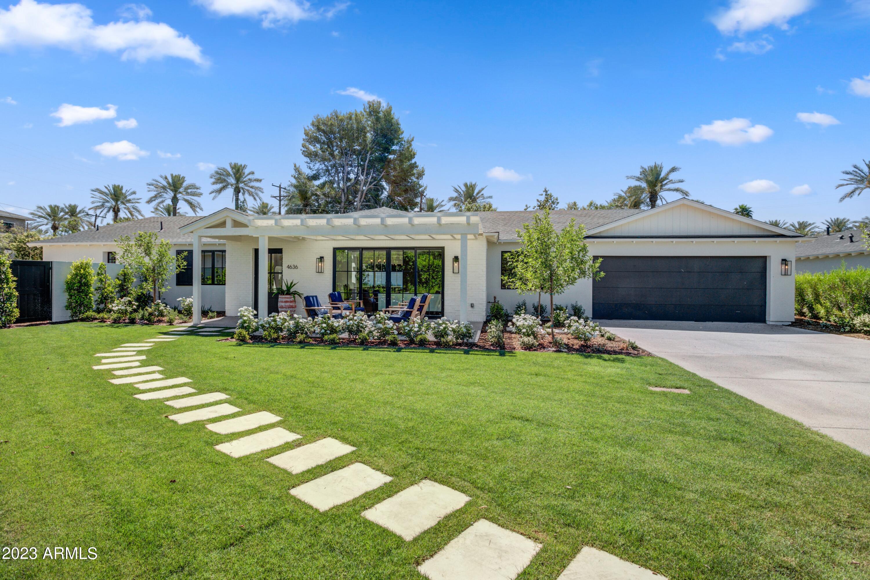 A gorgeous new build in the heart of Arcadia on a charming cul de sac with Camelback Mountain Views!  Spacious home has 5 bedrooms all en suite plus a bonus room that could be media room or kids play room. Open floor plan with generous kitchen and bright inviting living and dining spaces.  You will love the Camelback views from your pool in the beautiful back yard.  Back yard landscape and pool to be completed by end of June.
