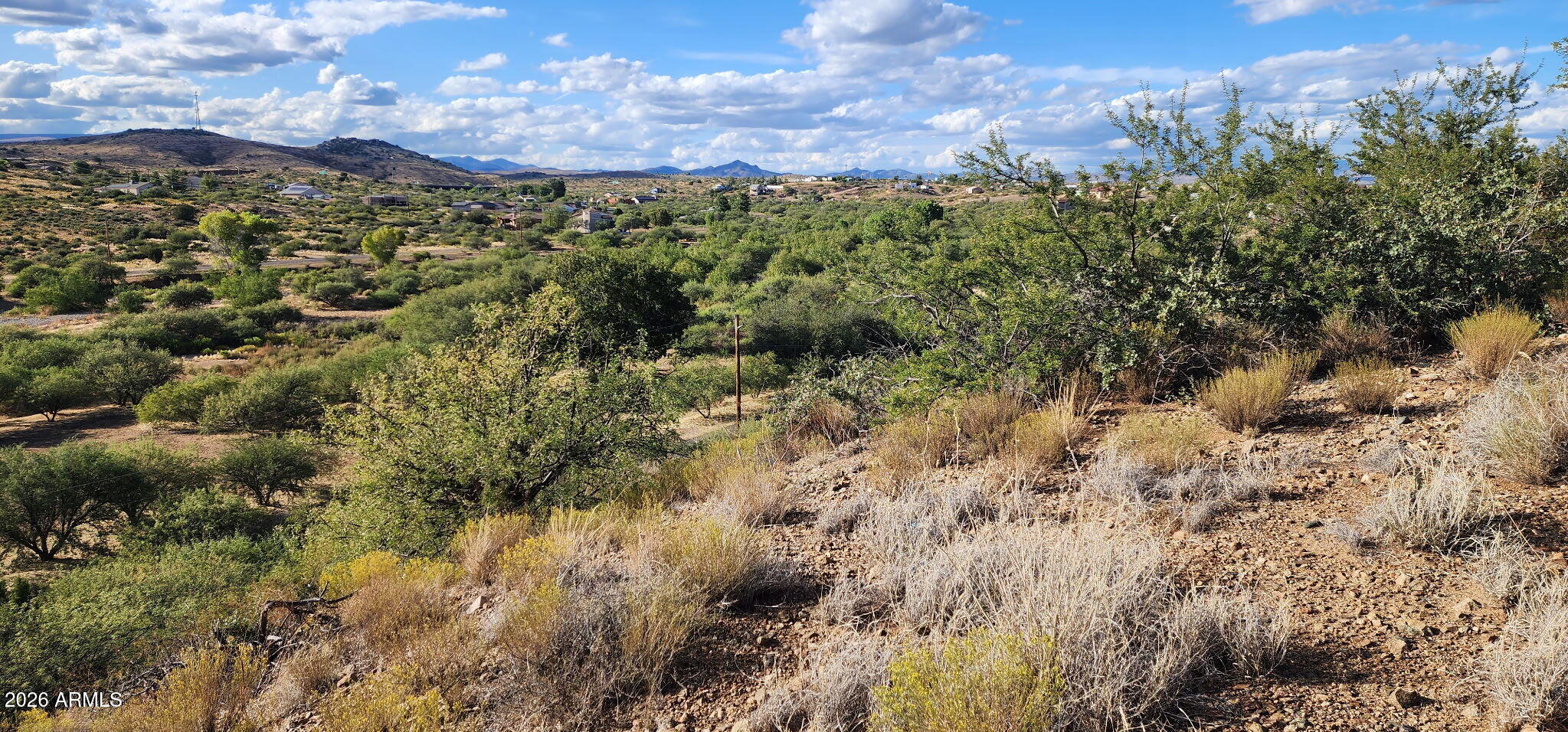 Rare opportunity to own 0.981 acres of peaceful Arizona countryside. This beautiful parcel offers easy access to water and electricity, making it an ideal location for your custom home or weekend retreat. Surrounded by mature juniper, mesquite, and cedar trees, you'll enjoy privacy, stunning Arizona skies, and abundant wildlife, including deer, javelina, and quail. 
Priced accordingly to allow the buyer to obtain the necessary engineering and soil reports and permits for development. If you're looking for tranquility, natural beauty, and room to create your vision, this pristine Cordes Lakes property is ready for you.