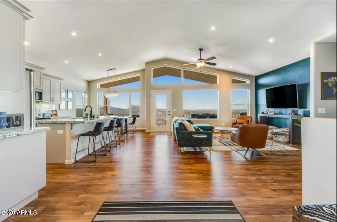This is one of the rarest unicorn properties you will ever see. Pictures cannot capture the gorgeous panoramic views. Live like you're in the quiet countryside but only a 5 min drive to downtown Prescott. Newer build on just under an acre, the first level, which is on the ground floor with no stairs, has 3 bedrooms & 2 full baths. Split bedroom floorplan with drop dead amazing views from every window. Watch the sunset over Granite Mountain from the balcony that runs the length of the home. Monsoons, snowfall, sparkling city lights & wildlife can all be taken in from your perch above the trees. Downstairs you'll find a second master with full bath & walk-in closet, living room and it's own balcony & separate entrance. Great views here too? Check! Oversized 3 car garage with epoxied floors, water softner, NO HOA (yay!) and fresh interior paint thoughout. There is a workshop/storage area downstairs. This and another area under the home could easily be finished to increase sq footage
This property is currently being used as a vacation rental with a proven track record, bookings through 2026 & great reviews. It can be sold fully furnished & set up. Owners are willing to stay on as co-hosts or get new owners up & running and then hand it off for them to run. Property can also be cleared out for an owner occupant.