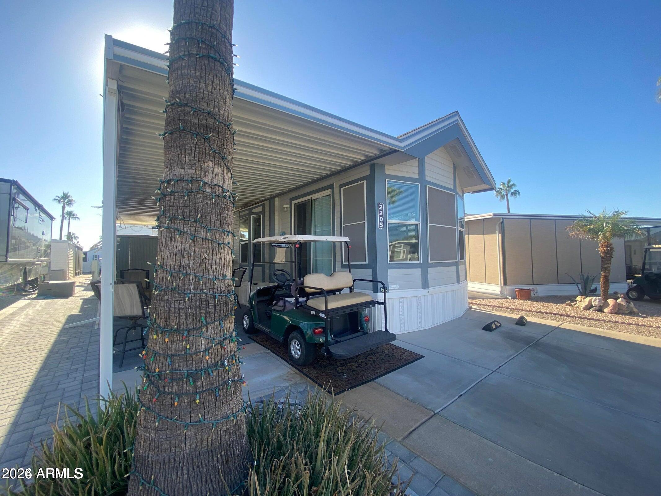 Beautifully updated and furnished winter home in the best 55+ golf course resort in the east Valley! Lots of counter space in this well-equipped kitchen that includes a built-in dishwasher. Spacious covered patio with custom sun sunshades. Upgraded electrical, solid surface flooring throughout. Large storage shed with washer and dryer included. Plenty of room to park two vehicles plus a golf cart. View the Superstition Mountains from inside the cozy living area. Turn key and move in ready, come and enjoy the Arizona sunshine this winter!