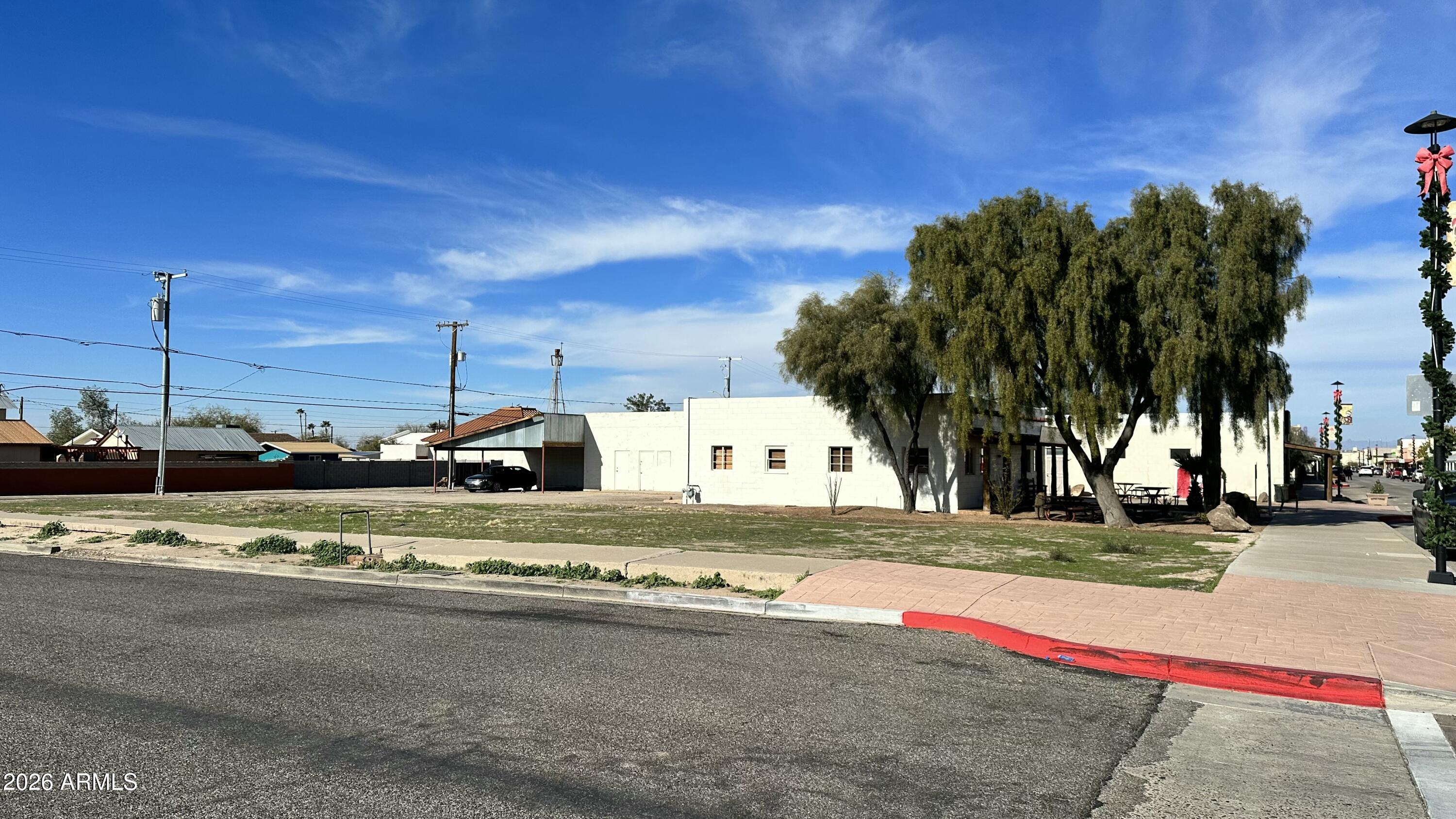 LOT ON MAIN STREET IN FLORENCE ARIZONA! SELLER WILL CARRY WITH $25k DOWN. MOTIVATED SELLER! THE OWNER HAS MULTIPLE PROPERTIES IN THE REGION. BE IN THE MIDDLE OF PINAL COUNTY'S LONG TERM GROWTH STORY! INQUIRE FOR MORE INFORMATION. PRICED FOR A QUICK SALE. BUYER TO VERIFY SCHOOLS, ZONING / USE, UTILITIES, BUILDABILITY AND ALL PERTINENT INFORMATION. ALL INFORMATION DEEMED ACCURATE BUT NOT GUARANTEED. SUBMIT ALL OFFERS! OWNER/AGENT