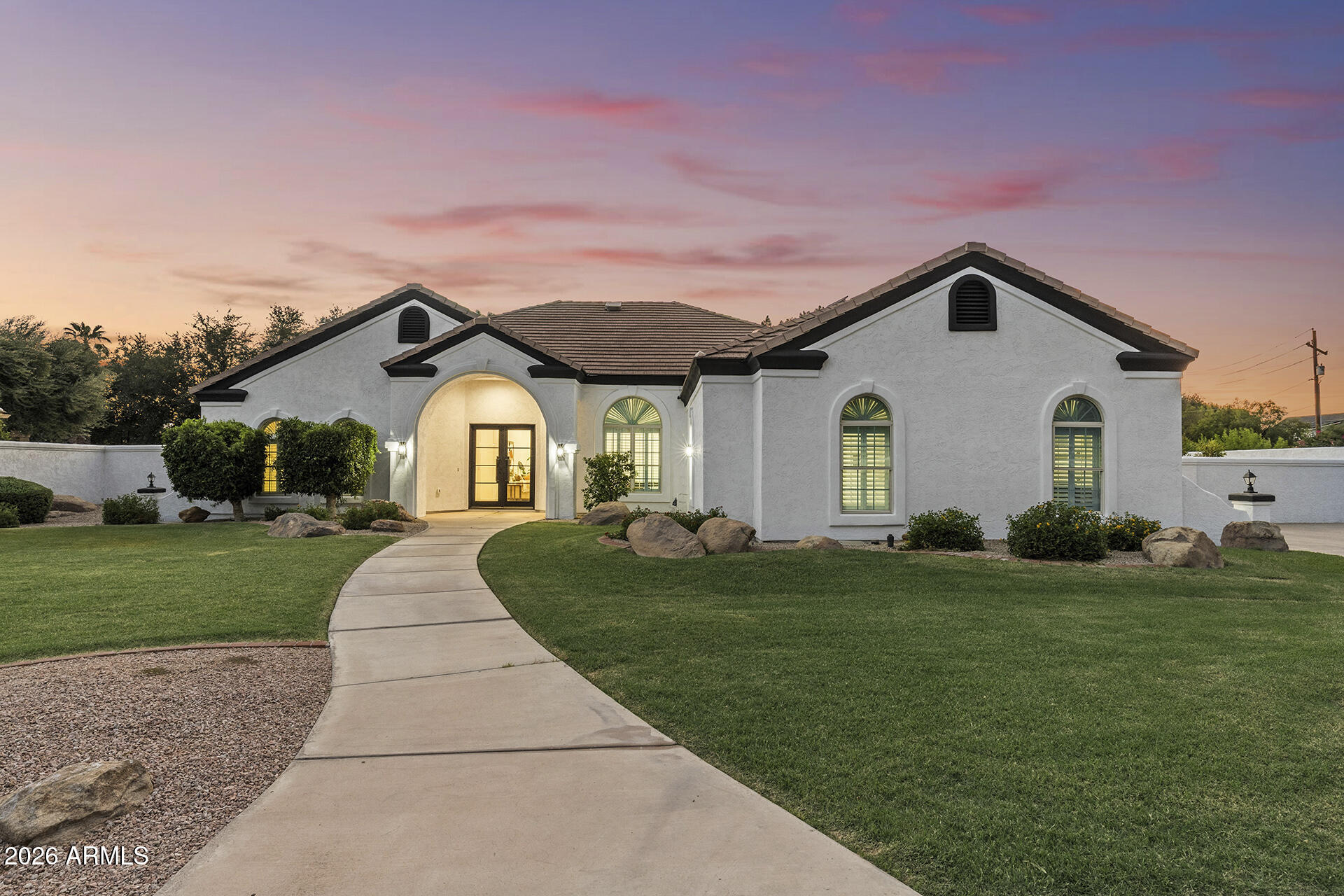 Like a brand-new luxury home, without the wait! This stunning, 100% remodeled residence showcases designer finishes throughout and offers the perfect blend of space, elegance, and modern efficiency. Nestled in an exclusive gated community, this exceptional home features 4 bedrooms, 3.5 baths, a versatile den, guest quarters, a basement, and an Arizona room across an impressive 3,100 sqft of beautifully reimagined living space. Set on a sprawling 16,583 sqft lot, there's room for everyone to live, work, entertain, and unwind. Owned Solar adds energy efficiency, while the expansive layout provides flexibility for multigenerational living, hobbies, or hosting guests. Combining luxury, location, and timeless style, this move-in-ready home offers everything you've been looking for and more!