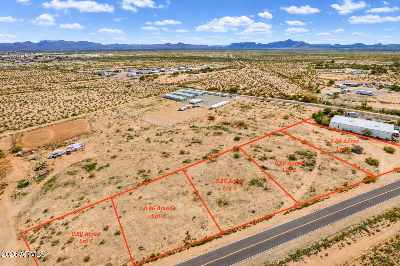 Prime C-2 commercial land with high-visibility frontage on paved Salome Road in La Paz County. This site offers flexible General Commercial potential—ideal for C2 zoning businesses. Level desert terrain with easy drive-up access makes site work straightforward. Adjacent companion parcels (APNs 304-56-002K/-002L/-002M/-002N/-002P) are available—purchase one or assemble multiple for a larger footprint. Buyer to verify use, access/curb cuts, utilities, flood status, and all development requirements with La Paz County.