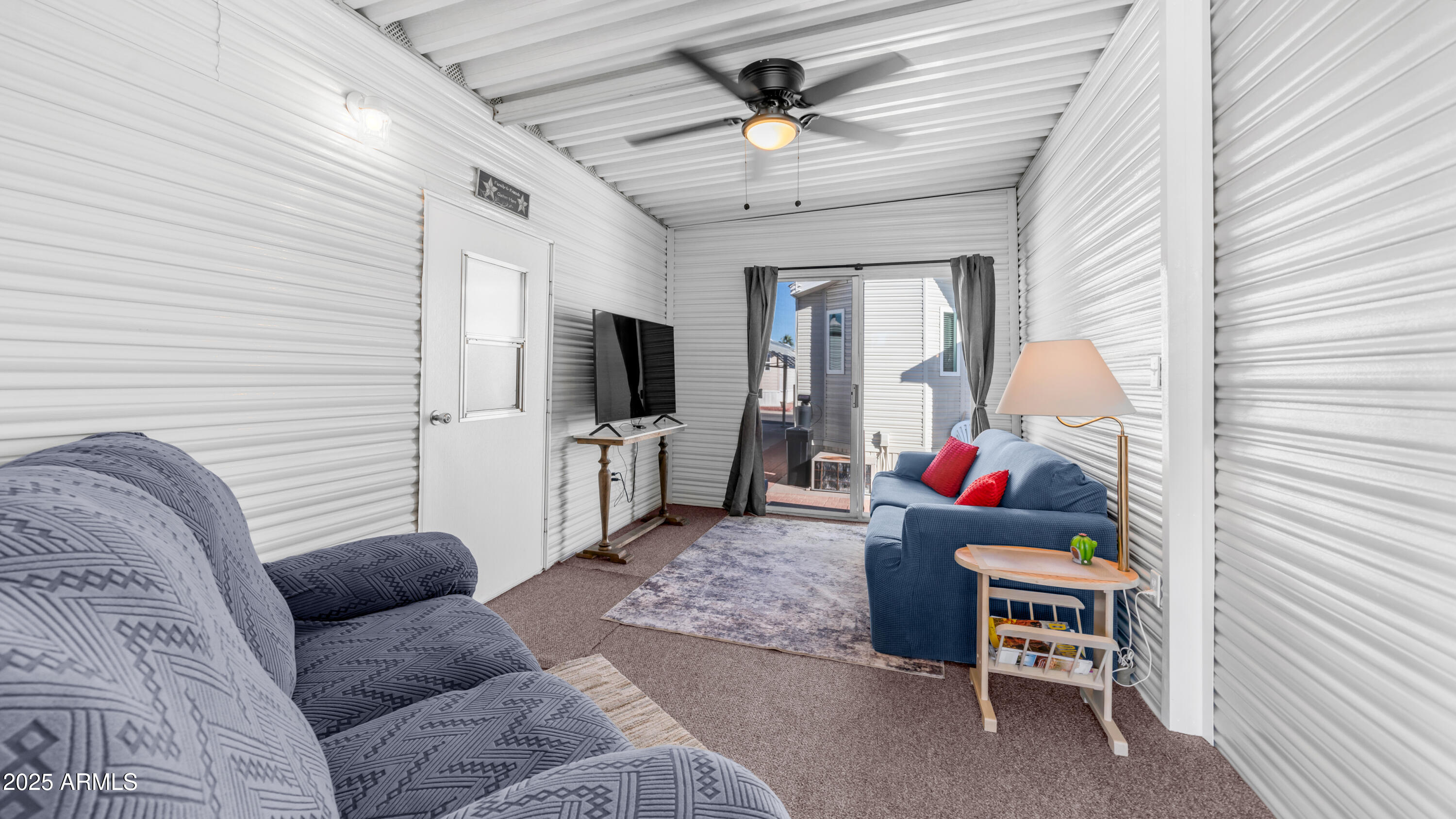 Step right into this Golden Vista charmer where the fun begins before you even reach the front door thanks to a spacious outdoor deck with brand new carpet & railing that practically begs you to sit down, sip something delicious & brag to your friends about the weather. The entire exterior was freshly painted, the new shingled roof is ready to impress & the storage game is strong with pull out drawers under the home including two shiny new ones that are ready for all the things you swear you will organize someday. Head inside to vaulted ceilings with zero popcorn in sight, new ceiling fans, new light fixtures & wood look laminate flooring throughout that makes the whole place feel extra polished without requiring you to become a professional floor cleaner. The kitchen is wonderfully open with a full sized ceramic top stainless steel stove, updated painted cabinets with new hardware & plenty of cabinet space for snacks, gadgets or those random souvenir cups you refuse to let go of. Enjoy the perks of a new forty gallon water heater, water softener & brand new plumbing throughout which means fewer surprises & more relaxing. The casita is the perfect little getaway for guests complete with a cozy bed, half bath & stacked washer & dryer so company can do their own laundry which honestly should be a requirement everywhere. Thanks to the newly added fifth wall & new back door you can live indoors or outdoors in just about any weather which is exactly why this place feels like the crowned jewel of resort living. Add in Golden Vista's amazing amenities, endless activities, friendly neighbors & true resort style atmosphere & you just might find yourself wondering how you ever lived without your own outdoor living room.