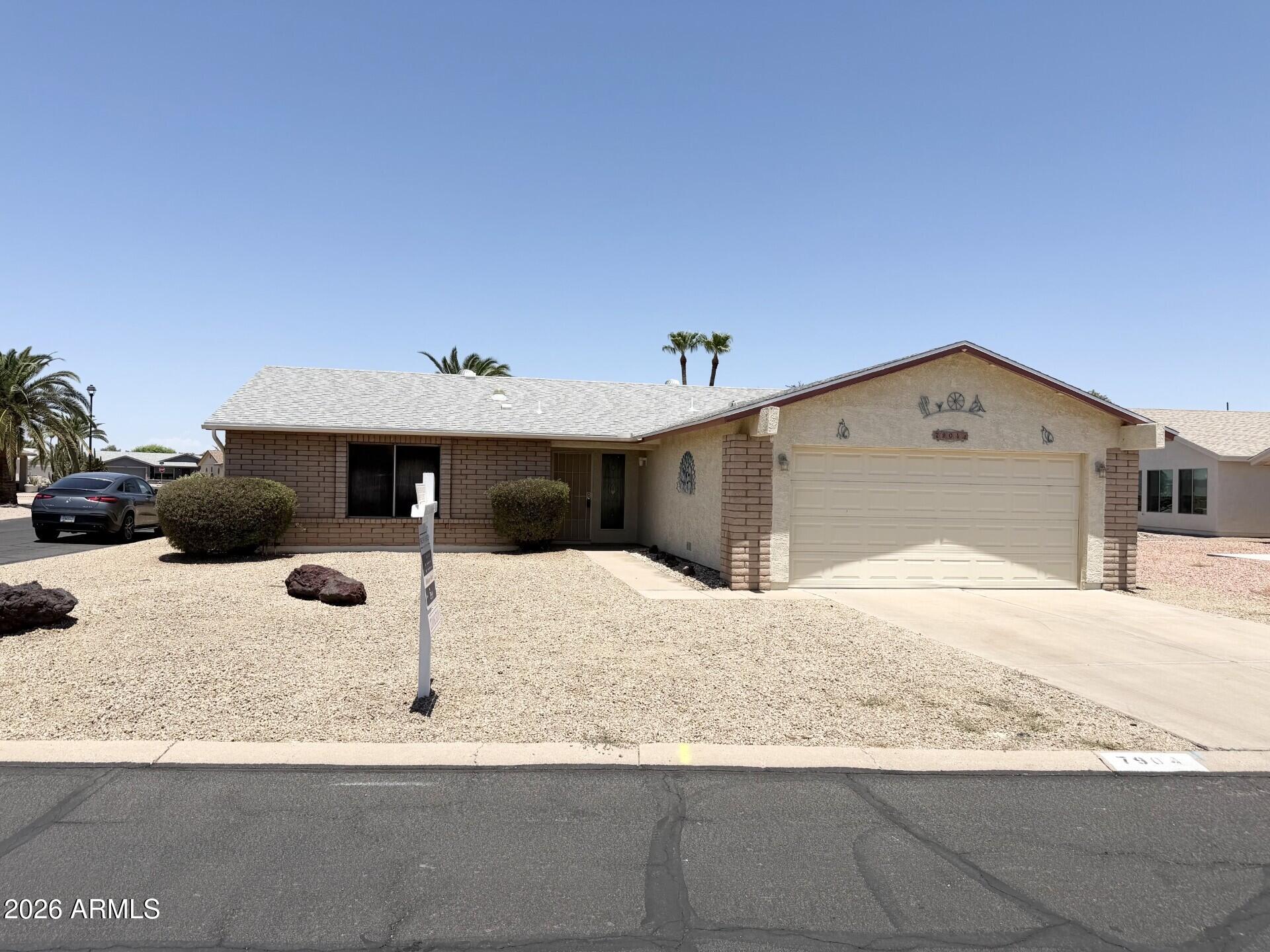 Great Home located in the Highly Desirable Fountain of the Sun 55+ Guard Gated Community. This 2 Bedroom Plus Den/3rd Bedroom and 2 Bathroom offers a bright, open layout with fresh interior paint, The spacious living and dining areas flow seamlessly into a well-appointed kitchen featuring ample cabinetry and a cozy breakfast nook. Nice Sized Primary Bedroom with Walk-In Closet & Step-in Shower, Nice Sized Guest Bedroom, A Screened in Patio provides a relaxing or entertaining space with Fruit Trees, New Roof (2019), New Heat Pump (2019), Insulated Garage Door, Storage Room in Garage, FOS community features an 18 Hole Golf Course, Heated Pool and Spa, Fitness center, Pickleball Courts, Bocce Ball, On-site Dining, and 24/7 Guarded entry.