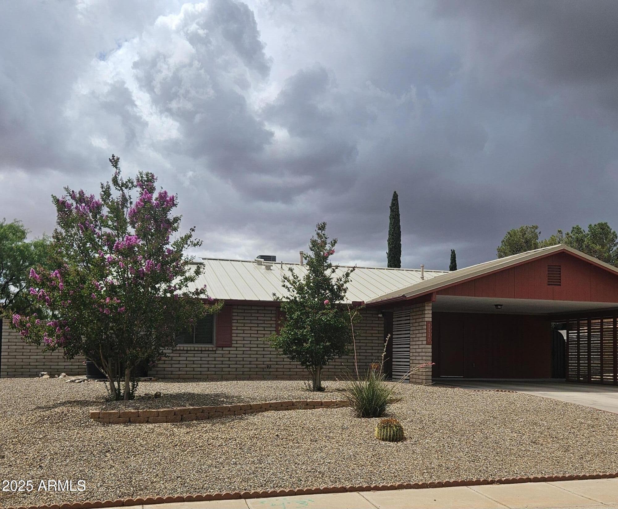 Upgraded, well maintained and well loved. Kitchen and dining room have been completely redesigned and remodeled to offer maximum efficiency and comfort. Both bathrooms have also been remodeled and show beautifully. Home has a newer metal roof. Anderson windows. Ceramic tile floors through out. Granite kitchen countertops. Corian bathroom countertops. Many more items that are new or newer! Come see this lovely home for yourself!