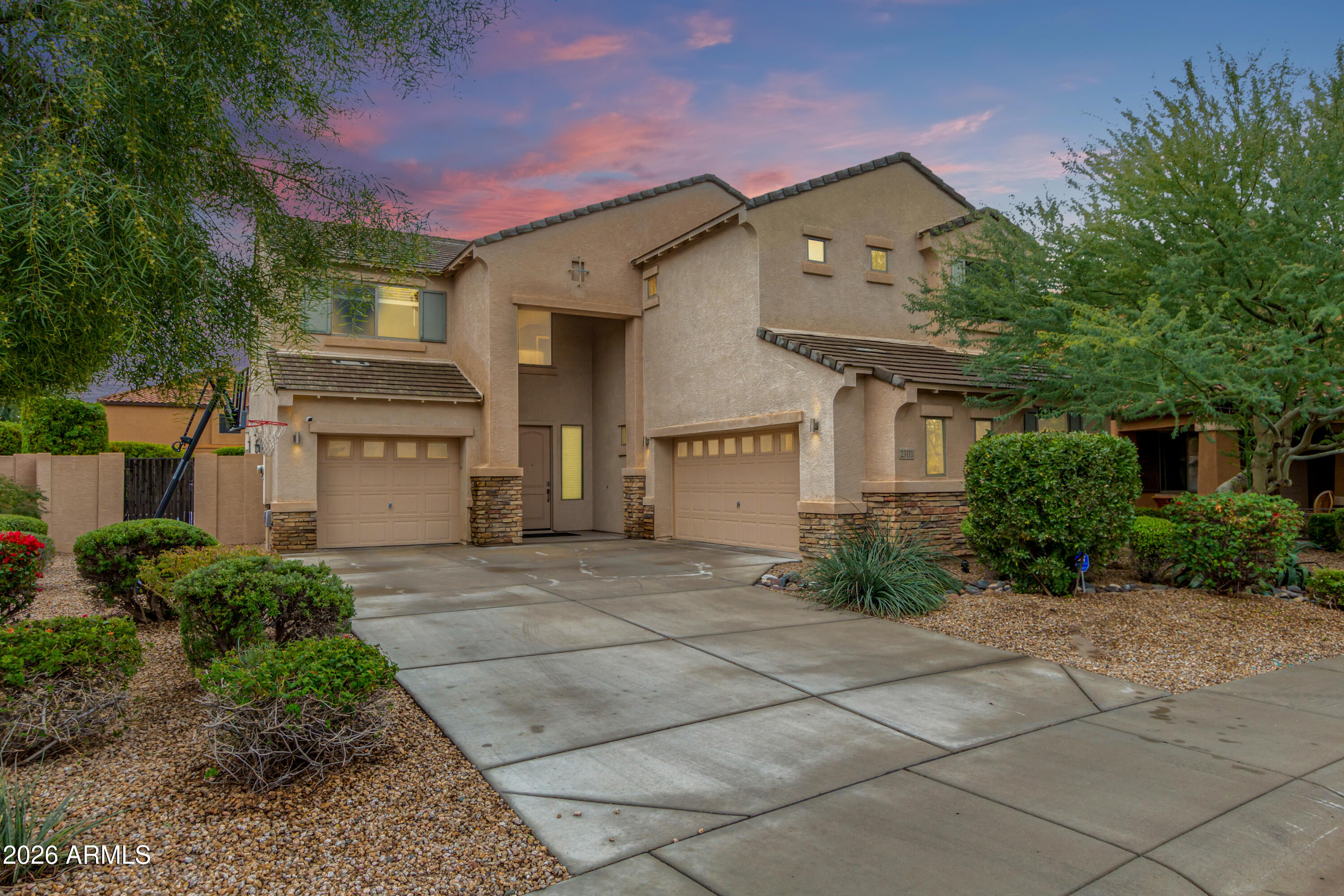 Modern and Spacious! 3500sqft, 4 Bedroom + Loft, 2.5 Bathroom home in one of North Phoenix's most desirable neighborhoods. Located near Desert Ridge, this beautifully designed home combines sleek, modern finishes with everyday functionality.  Offering plenty of room to spread out, enjoy two living areas downstairs PLUS a large loft upstairs. The updated Kitchen features trendy Euro-style cabinets, Quartz countertops with waterfall island, large walk-in pantry, RO system, stainless steel appliances including built-in wall oven and gas cooktop.  Upstairs, Large Master Suite and 3 additional guest rooms provide amble space and flexibility for whatever suits your needs. 3Car Garage with built-in cabinets, EV charger & water softener. Outside, mature landscaping and fruit trees ensure privacy.. while you enjoy the beautiful swimming pool with waterfall feature, putting green, or just relax on the large covered patio with automatic shades, firetable and built-in BBQ.  Welcome to your beautiful dream home!