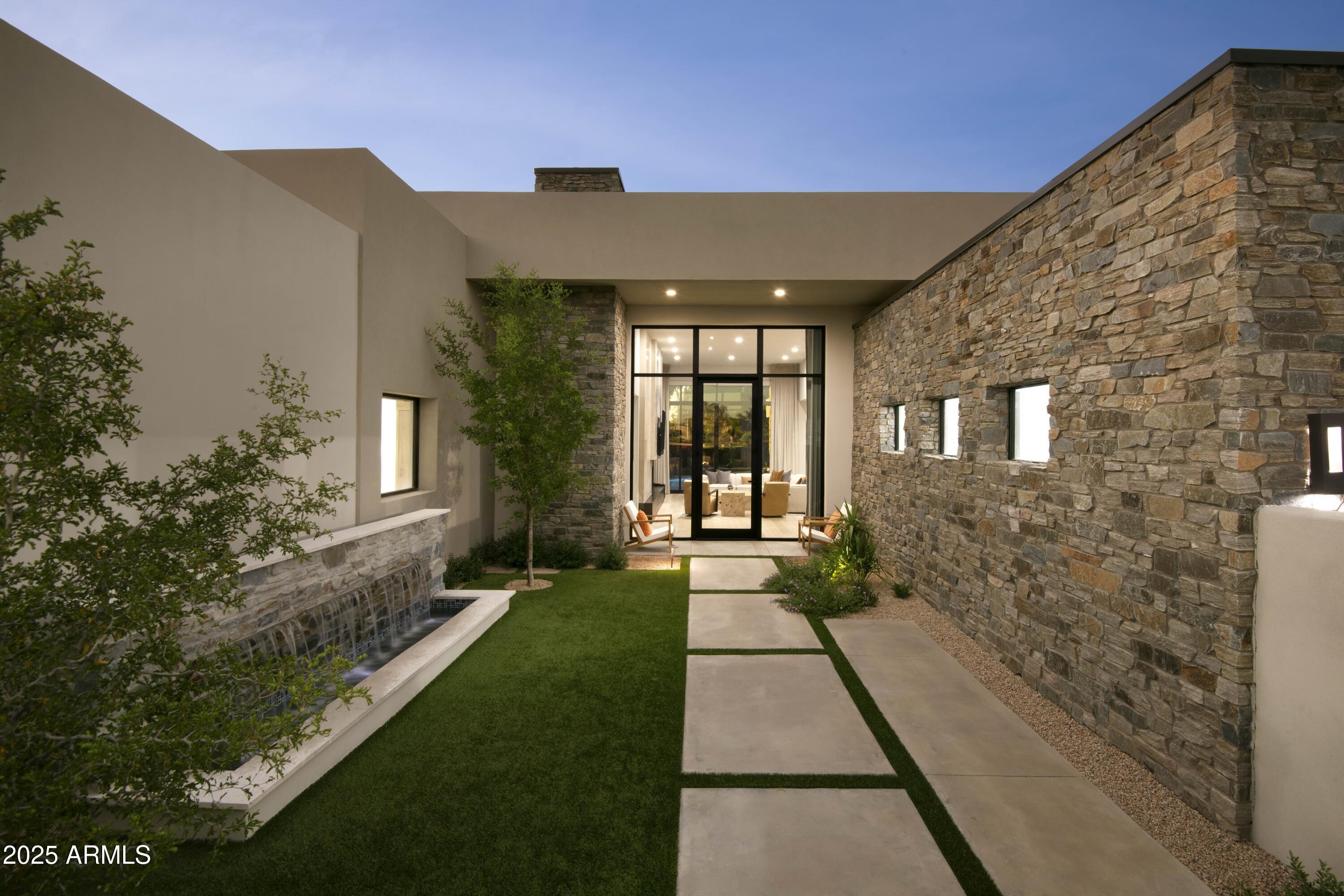 Welcome to Ironwood Golf Villas, an intimate, gated community of just eight custom homes, thoughtfully designed and built by renowned luxury homebuilder Cullum Homes. This beautifully crafted residence offers 4,723 square feet of luxurious living, fully furnished living space, designed for both comfort and style. Inside, the home blends modern elegance with comfortable livability. The chef's kitchen features top-of-the-line stainless steel appliances, sleek cabinetry, and refined finishes that make everyday living and entertaining a joy. Each bedroom is a private sanctuary, complete with its own en-suite bath and walk-in closet.
Perfectly positioned to capture breathtaking views of the Camelback Country Club Golf Course and the surrounding mountains, this home provides a peaceful retreat The gated community entrance adds an extra layer of privacy and peace of mind. Just minutes from Old Town Scottsdale, Fashion Square Mall, and some of the best dining and entertainment in the Valley, this home offers the perfect balance of tranquility and convenience.
This is more than just a home, it's a refined, welcoming space where luxury and warmth live in perfect harmony.