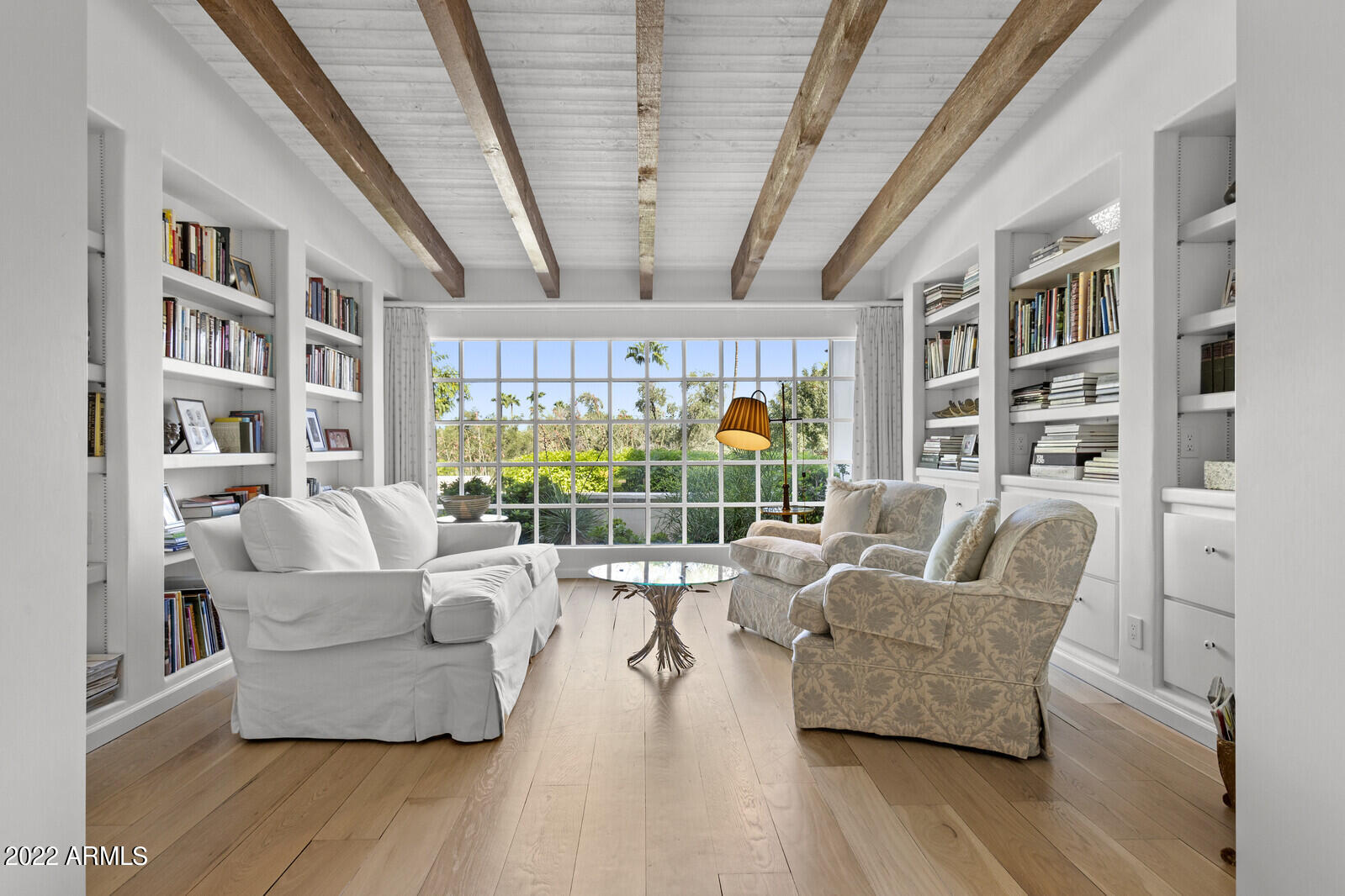 LOS OLIVOS - Nestled in the foothills just north of prestigious Paradise Valley Country Club, this beautiful home offers 4,980 square feet of exceptional quality and tradition, as it evokes feelings of peacefulness, relaxation, and charm. With warm comfortable spaces and authentic details, this stunning home reflects the Santa Barbara - Montecito vernacular.  Solid concert block construction - decorated and further protected by stucco, a sixty-foot covered veranda, a clay-fired barrel tile roof, a large inner courtyard warmed in winter by a welcoming fireplace, a heated forty-foot swimming pool, beautifully sized exterior sconces, two interior wood-burning fireplaces, multiple exterior Bougainvillea vines; are just a few of the many attributes making this a truly comfortable yet remarkable place to call home.

Structural redwood beamed ceilings, seven-inch solid oak plank floors and original French inspired clay tile floors are all present and immune from years of use. Even the solid wood kitchen cabinets, featuring beveled glass inserts, were hand-crafted onsite to last a lifetime. Not to be forgotten, the lushly landscaped grounds include eight mature, fruit bearing olive trees.

This is a home not to be missed by those who appreciate craftsmanship the way it was before mass construction and cost control consumed the building trades. It is a home to be savored by those who have a sense of history, of art and design, and an uncompromised view of architectural distinction.

The home also has been maintained to be technologically up-to-date with a Sub-Zero refrigerator, Wolf gas range, whole house intercom, house & garden Wi-Fi, LED 'smart lighting', polished nickel Waterworks bathroom fixtures, and new electrical service. For the golfer, the home features a 1000 square foot putting green hidden from view.

Enjoy watching the video for a thorough introduction to this very special home.