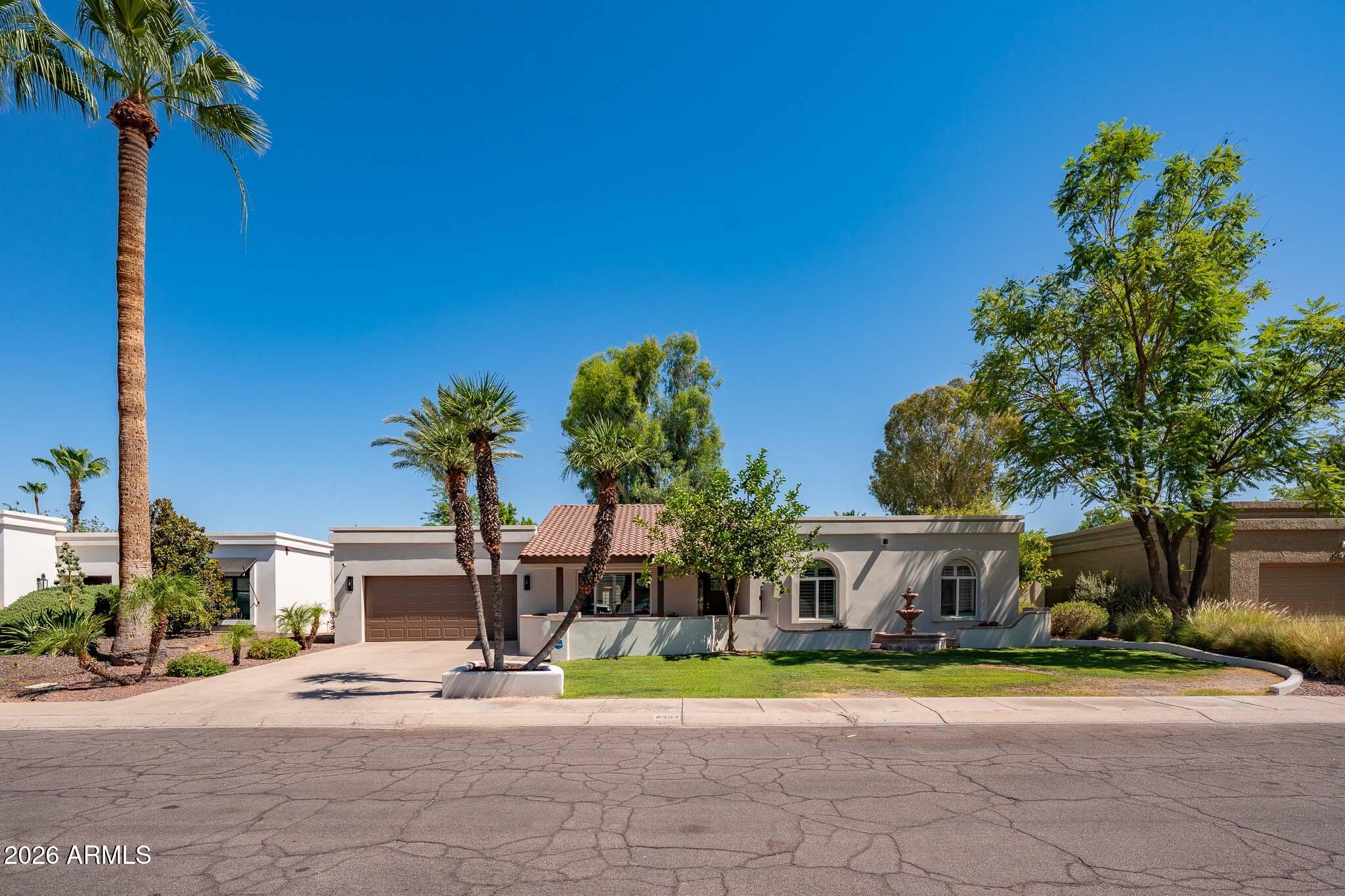 Welcome to one of McCormick Ranch's most beautifully updated residences, where luxury, comfort, and timeless Scottsdale living come together to create an extraordinary place to call home. Nestled within one of Scottsdale's most coveted and established communities, this exceptional property offers extensive upgrades inside and out, resort-style outdoor living, and a location that continues to be one of the most sought-after in the Valley.  From the moment you arrive, the home's stunning curb appeal sets the tone. Lush, professionally designed landscaping, a welcoming front porch, mature greenery, and a beautifully updated smooth stucco exterior create an impressive first impression. Step inside and you'll immediately appreciate the attention to detail and thoughtful enhancements that make this home truly special.  A previous renovation introduced significant updates throughout the property, and the current owners have taken the home to an entirely new level. Beautiful flooring flows throughout the residence, complemented by custom paint, designer lighting, and carefully curated finishes that create a warm yet sophisticated atmosphere. Natural light fills the open-concept floor plan, creating an effortless flow between living, dining, and entertaining spaces.  The kitchen serves as the centerpiece of the home, featuring striking two-tone cabinetry, custom hardware, designer backsplash, granite countertops, stainless steel appliances, double ovens, updated fixtures, and abundant workspace for both everyday living and entertaining. The beautifully updated bathrooms showcase custom tile work and quality finishes, while updated windows, interior doors, plumbing fixtures, and numerous additional improvements provide peace of mind and modern convenience.  
The backyard is where this property truly shines. Designed to feel like a private resort, the outdoor living spaces invite you to relax, entertain, and enjoy Arizona's incredible climate year-round. Extensive travertine surrounds the pool and patio areas, creating a luxurious setting enhanced by a custom gazebo/ramada, mature landscaping, and multiple gathering spaces. Whether hosting friends, enjoying a quiet evening under the stars, or spending the afternoon poolside, this backyard delivers the type of lifestyle buyers dream about when they imagine living in Scottsdale. 
Beyond the property itself lies the unmatched lifestyle that has made McCormick Ranch one of Arizona's most iconic communities. With inventory consistently limited and demand remaining strong, opportunities like this are increasingly rare. Residents enjoy miles of picturesque walking and biking paths winding through lush greenbelts, lakes, parks, and mature tree-lined streets that create a setting unlike nearly any other neighborhood in the Valley. Morning walks, evening bike rides, waterfront sunsets, golf outings, and year-round outdoor recreation become part of everyday life.
Perfectly positioned in the heart of Scottsdale, the home offers convenient access to world-class golf, premier shopping, upscale dining, luxury resorts, spring training baseball, entertainment venues, and some of the Valley's most celebrated destinations. Old Town Scottsdale, Scottsdale Fashion Square, Talking Stick, Salt River Fields, fine dining, art galleries, and the Loop 101 corridor are all just minutes away.
More than simply a home, this is a rare opportunity to enjoy the McCormick Ranch lifestyle at its finest--where every day feels a little more like a vacation and where luxury, convenience, and community come together in one exceptional address.