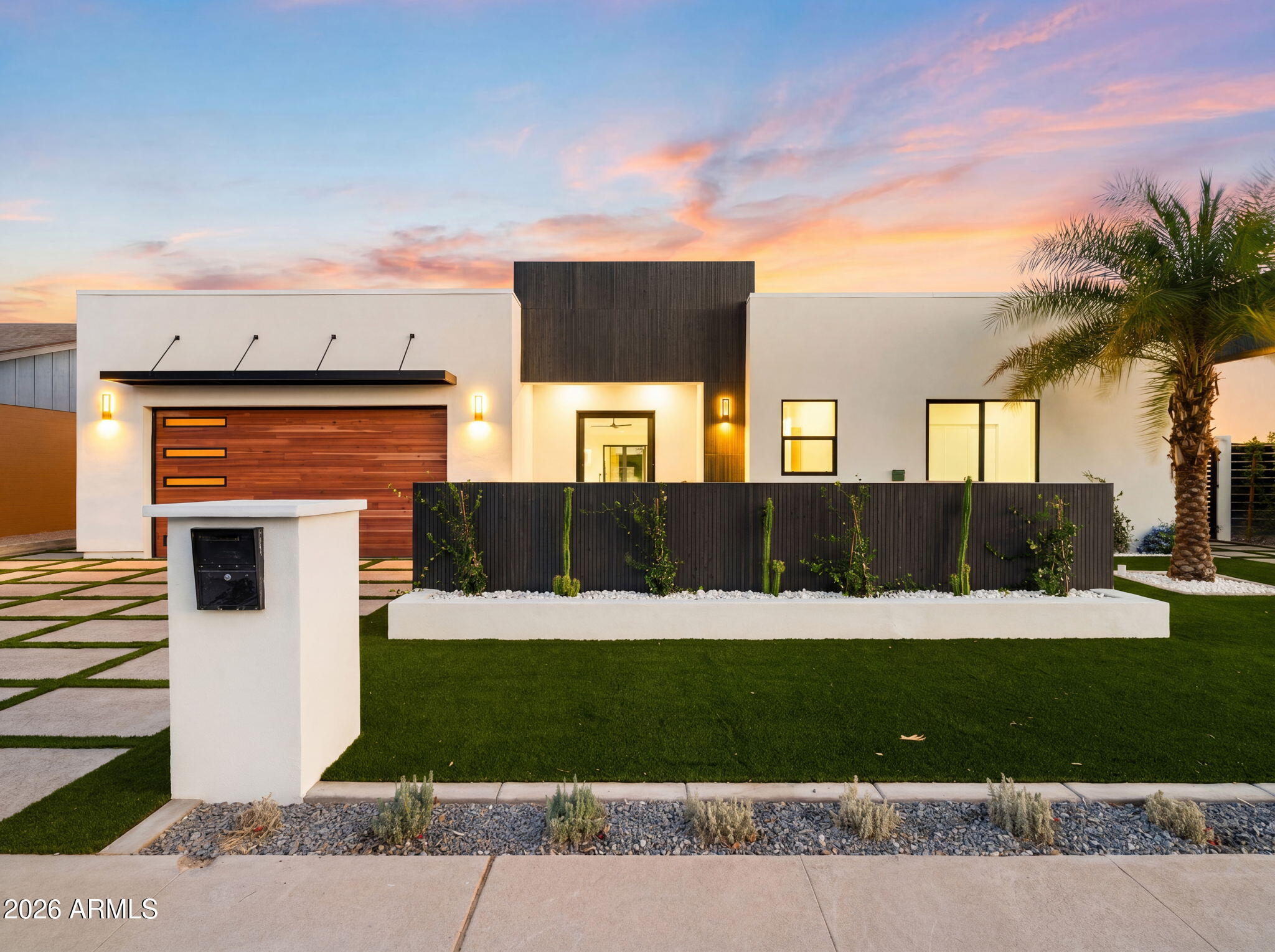 New Construction in the Heart of Scottsdale -- Unbeatable Location! 
This professionally designed luxury home showcases exceptional high-end finishes and thoughtful modern design throughout. The expansive great room flows seamlessly into a chef's kitchen featuring Taj Mahal Quartzite countertops, sleek european custom cabinetry, and a spacious walk-in pantry. Double size Forno refrigerator and freezer! Perfect for entertaining and everyday living. Designed with comfort  and privacy in mind, the home features two primary suites, both with access to the resort-style backyard. The main owner's retreat offers a true spa-like experience with a large walk-in shower, a well-appointed large walk-in closet, and elegant designer details. Enjoy effortless indoor-outdoor living with oversized glass bifold doors opening to a stunning resort-style backyard. The low-maintenance outdoor oasis features a custom pool and spa, expansive covered patio, built-in grill kitchen station with countertop seating, outdoor shower, fire pit, and shaded entertaining areas -- ideal for enjoying Scottsdale's beautiful weather year-round. Located just minutes from premier golf courses, upscale shopping, fine dining, world-class entertainment, and Scottsdale's renowned nightlife, this home offers luxury living in one of Arizona's most desirable locations.