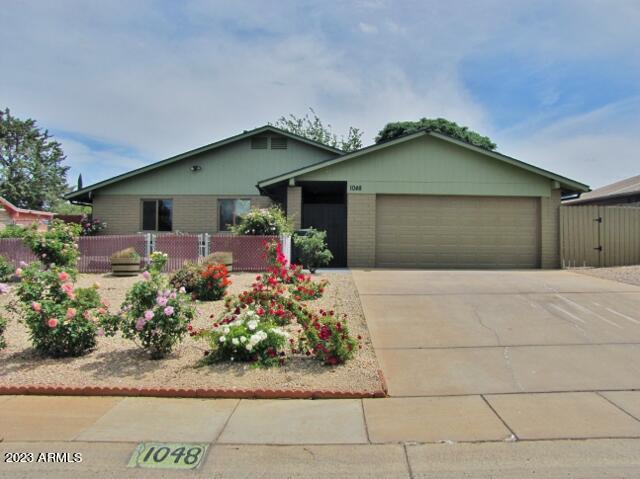 This nicely updated, 4BR/2BA/2CG, 1416 sq.ft. home is centrally located in Sierra Vista, AZ minutes from Ft. Huachuca, shopping, schools and Canyon Vista Medical Center.  The floor plan plan has a large living room, open kitchen with modern black, S/S appliances, central A/C and a 2-car garage.  The yards are fully landscaped with beautiful rose bushes and a large storage shed with available electric.  Call today.