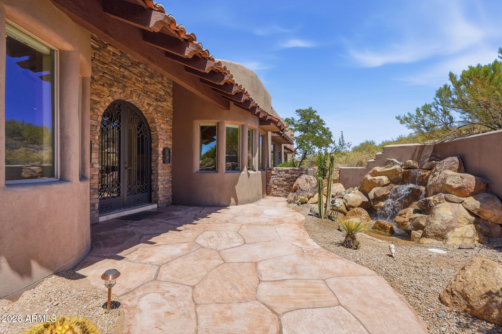 PANORAMIC VIEWS on 4.6 AC in Carefree! IMPRESSIVE MULTI GENERATIONAL HOME! TWO SEPARATE LIVING AREAS/MASTER SUITES!  4 Bd total (2 Master Suites) /PLUS separate  OFFICE/4.5 Bath, 4CG. MAIN LEVEL is Primary Suite/full laundry/1 BR-ensuite & office PLUS-Greatroom Flr plan;Soaring ceilings;cofferred ceilings; 3 Gas FP(in LR/FR/PRIMARY)-Lg Formal Dining area;Wet bar;Eat in kitchen; kitchen bar.Travertine floors, Stainless viking appliances.Walk in pantry.Double ovens; Gas cooktop, Granite countertops, custom finishes throughout! DOWNSTAIRS has spacious LR (no kitchen) 2nd Primary Suite/1 BR -ensuite bath another Laundry room/Walk in Wine Room (not hooked up) Flagstone patios front & back;covered balcony;negative edge pool (heated) & spa.So much more!Solar Panels leased . Great Value Here!