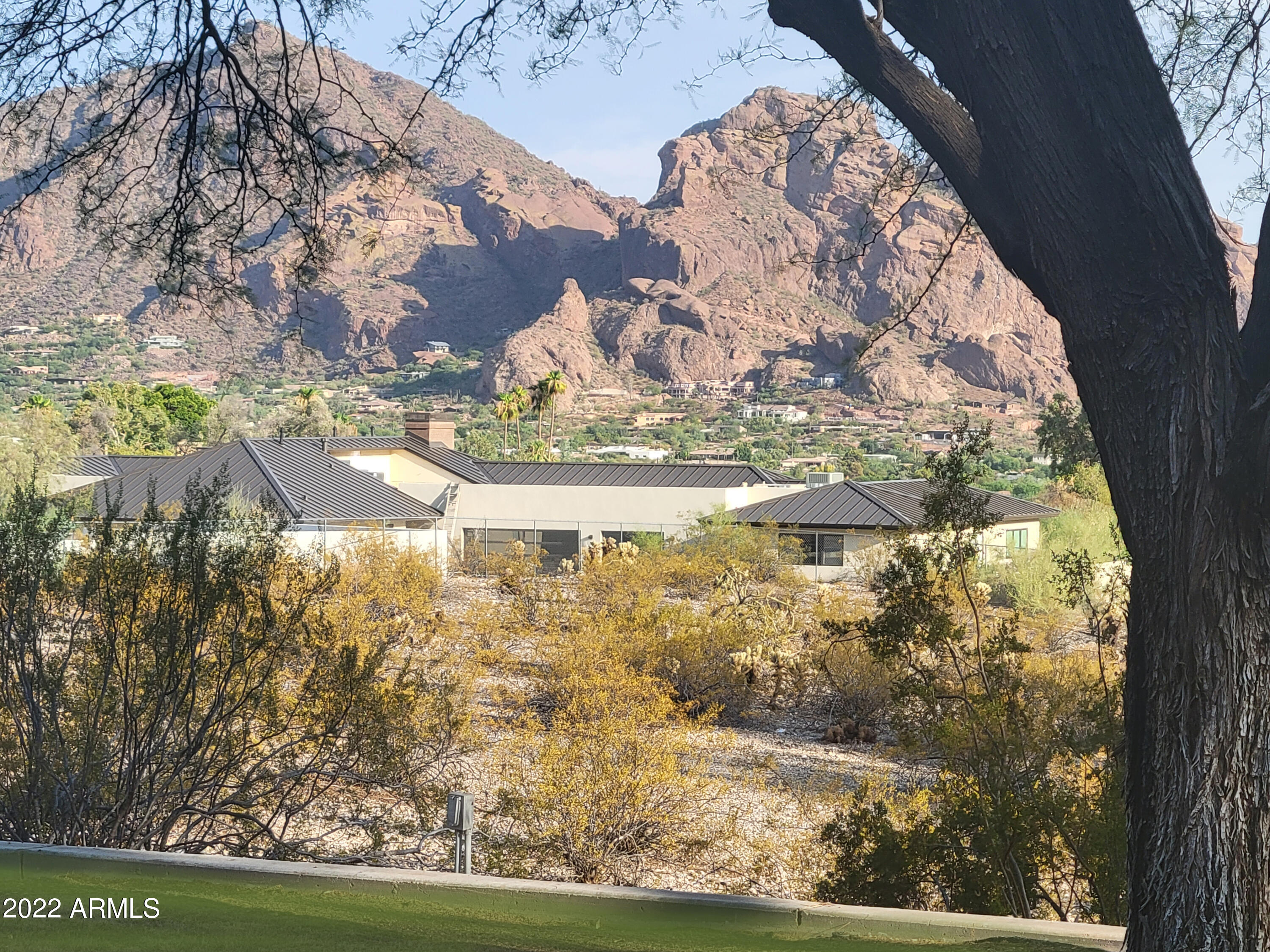 3+ exceptional acres.  This is a property where the views seriously ought to be experienced in person.  Incredible views of Camelback Mtn in a very private setting. The location is the true heart of PV; located at the very end of 46th St & snuggled within the afternoon shade of the Phx Mtn Preserve.  Opportunity to build new or expand on existing home.  The 3+ acres are buildable, elevated & gently sloped, NOT HILLSIDE. Dazzling sunrise & sunset reflections on Camelback Mtn. Property also listed under, ''Land & Lot'' MLS # 6395870.  PRICE INCLUDES TWO PARCELS - APN 169-14-003-X & APN 169-14-003-Z for total of 3.11 acres.     24 HOUR NOTICE PLEASE.  Scottsdale School District.