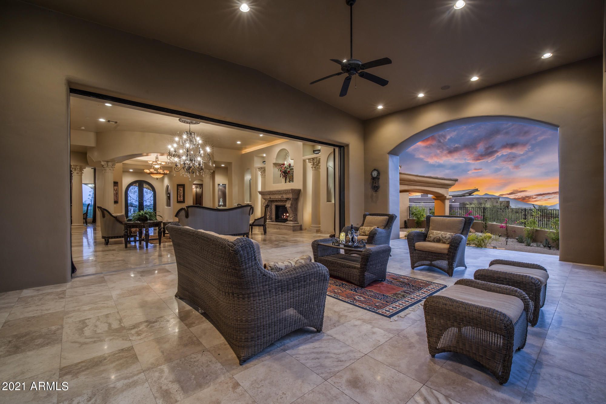 Exquisite Mediterranean home situated on a private and tranquil hilltop in the prestigious community of Gambel Quail of Desert Mountain. Custom built in 2007 to perfection with the finest finishes. This remarkable home boasts an open floor plan with a massive master suite, 3 en-suite guestrooms, 4.5 bathrooms, bonus/game room, dining room, gourmet kitchen, two kitchen islands, butler's pantry, a full bar, wine cellar, an elevator and multiple indoor and outdoor fireplaces. 
Upon entering the home you find yourself in dramatic foyer that opens to the colossal living room with spectacular views of mountains and manicured to perfection Renegade golf course. Oversized glass pocket doors lead to the 2000+ Sq Ft covered patio with BBQ, gazebo and 2 fireplaces overlooking the 18th fairway of golf course: making it a perfect place for entertaining or relaxing in serene beauty and peace. Grand master suite with luxurious bathroom features a steam room, dual head rain shower, jetted tub, and a large closet with custom cabinetry. Mountain, City lights and sensational sunset views from every window. 
Community offers endless amenities to it's residents including 7 Diverse Golf Courses, 7 Distinctive Club houses, 10 Restaurants and Grills, nine-Court Tennis Complex, Jim Flick Golf Performance Center, Dog Park, The Ranch and over 45 social clubs and activities. For more information please see the document tab.