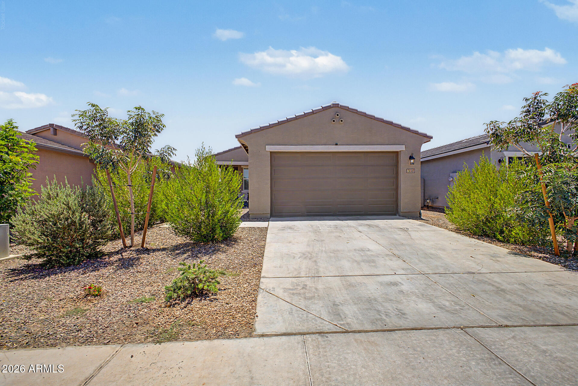 Nearly new, 2024-built, energy-efficient home! INCLUDES washer/dryer, refrigerator, dishwasher, and blinds! Enjoy a large kitchen island that offers plenty of prep space and informal seating for entertaining family and friends. Modern, white cabinets with contemporary hardware, granite countertops, and tile throughout the common areas, with carpet in the bedrooms. A standout feature of this 3-bed, 2-bath home is a bonus space that can be used as a home office, play area, or workout room. This family-friendly, gated community features an amenity center with a community pool, parks, and a sports court. MOTIVATED SELLER! Bring your offers.