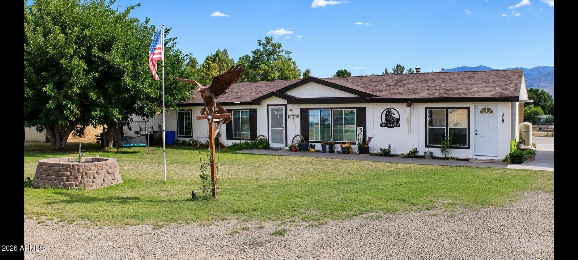 Are you looking for a HORSE PROPERTY IN TOWN?? Well, you have found it! This remodeled gorgeous manufactured home on almost an acre allows 2 horses and farm animals!  It also comes with an above ground pool, many storage/ outbuildings, chicken coops, pens, and sheds. Currently one side of the closed in carport is set up as the sellers Salon, and the other side is a chick brooder room, so it offers the opportunity for multiple uses, both rooms have AC.  The current home is fully electric, although there are propane hook ups in place if desired. This is a very unusual find in Cottonwood, especially at this price point! 

The portable horse panels and kennel do not convey.  Please be mindful of the animals when on the property, and please have agent accompany before accessing The property, due to animal safety. Come check out your own little mini farm just in the edge of town, it's the perfect combination of rural life, but still close to doctors, shopping, restaurants, and Old Town Cottonwood entertainment
