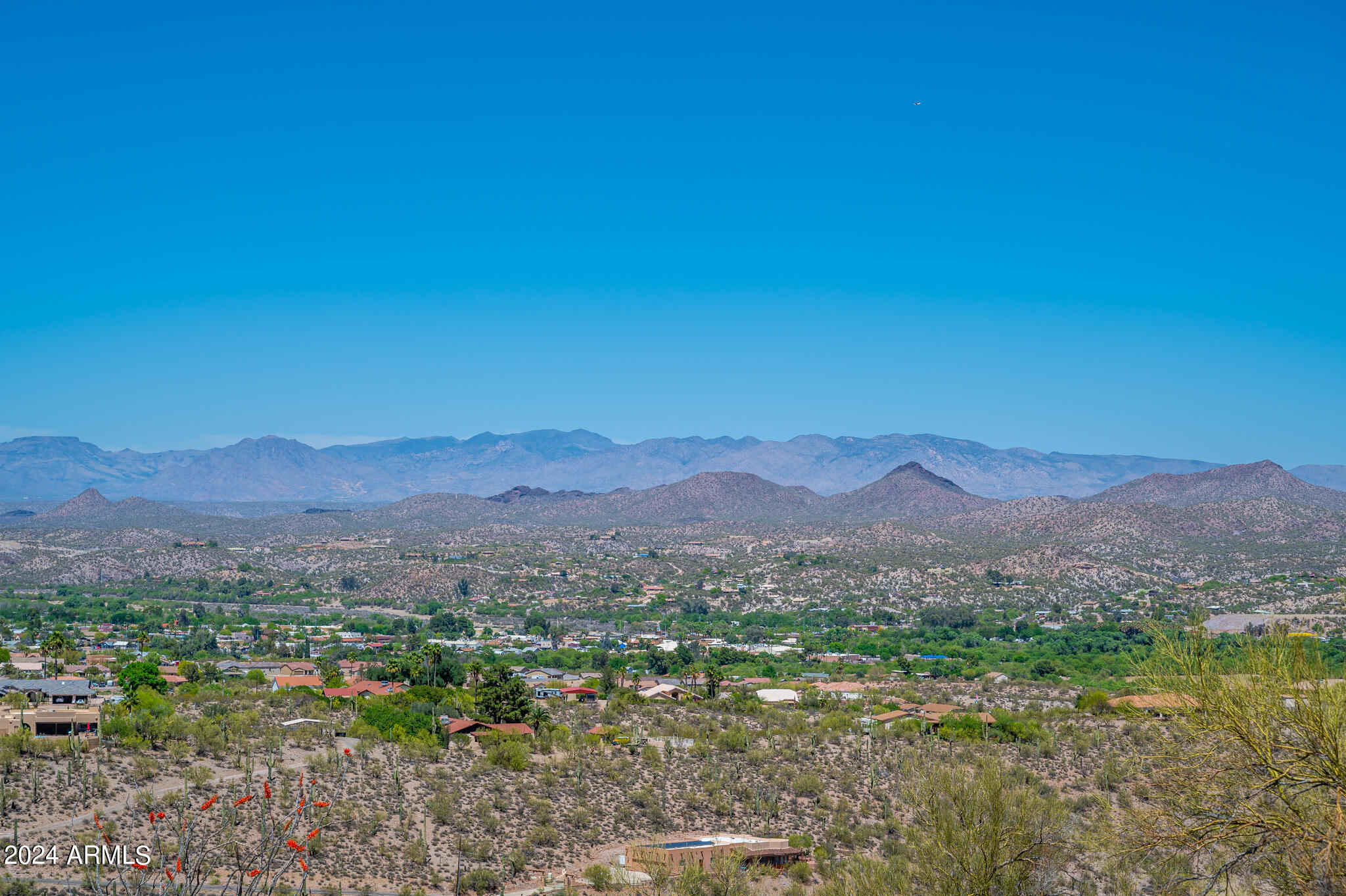 BUILD YOUR DREAM HOME! Incredible panoramic views on hilltop this lot. Over 4.4 acres & located in a prestigious neighborhood with easy access to town. Paved road access and underground power make this an ideal spot to build a custom home. The access to this lot is already gated and paved. Envision your future here with the Arizona's incredible sunrises and sunsets. Easy to show.