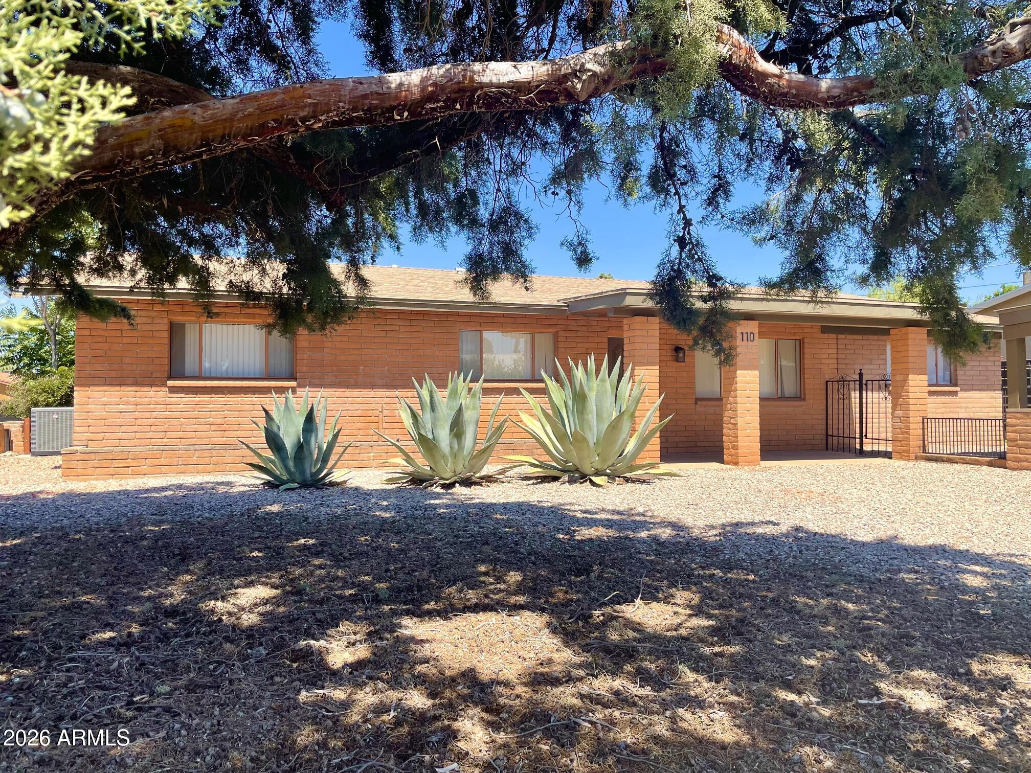 NEW lower price! Perfect midcentury 3bd/2ba 2,204sf desert home for those seeking a luxury lifestyle with an eye toward understatement. Outside, the easy-care landscaping, NEW septic in 2021, NEW 2-car carport and NEW central heat, A/C allows for convenience. The interior design has been executed down to the last detail. Major rooms include formal living and dining rms, separate great room and den. Kitchen hosts separate breakfast room and all NEW appliances. PLUS, there is a beautiful courtyard with a pavilion and lots of off-street gated parking for your cars, RVs, etc. Heated/cooled 600sf garage, with 220V, could make a fantastic workshop/studio. Quiet neighborhood. Located close to shopping, banking and restaurants. Buyer to verify all facts/figures.