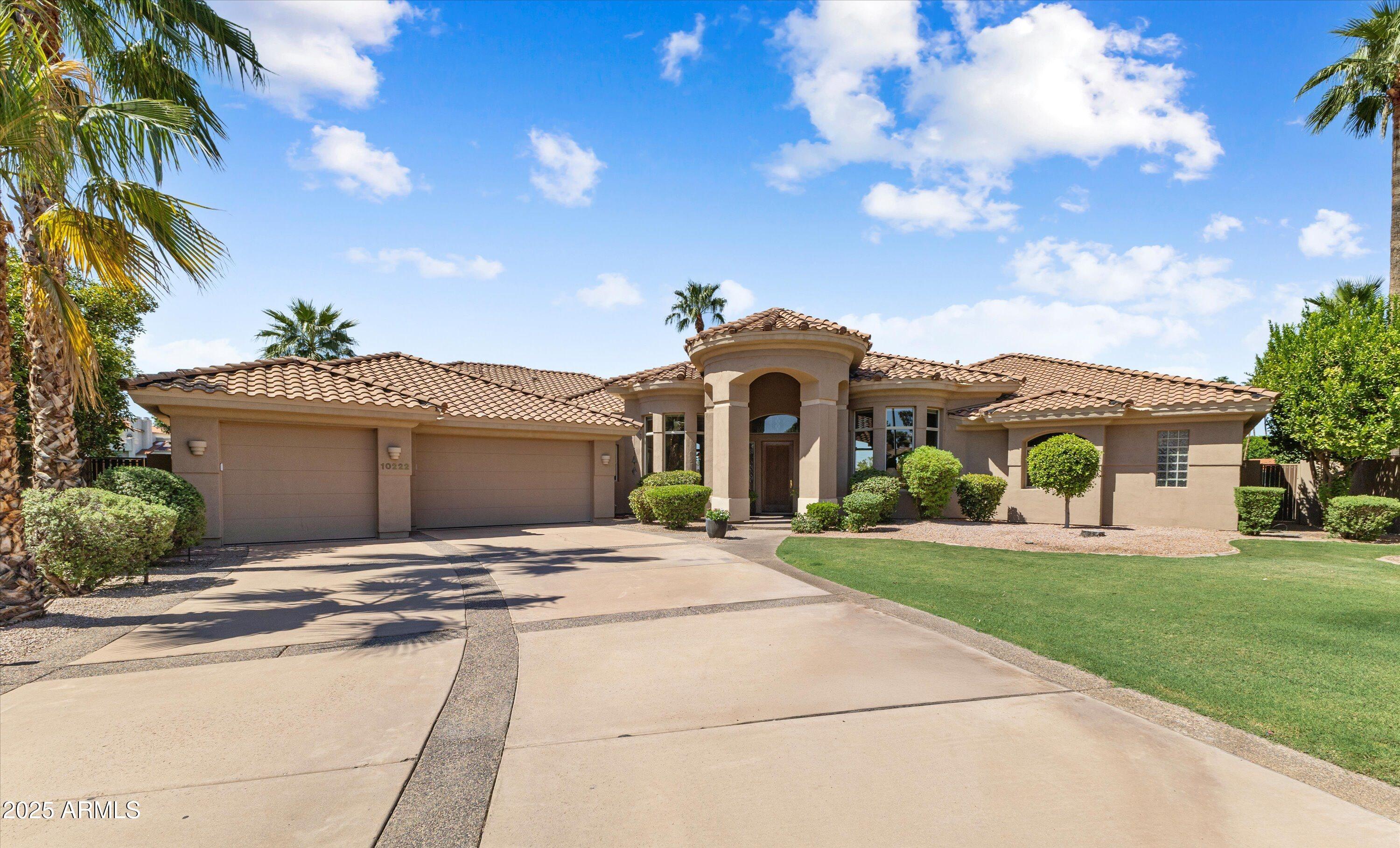 Rare opportunity to to pick up your very own desert oasis. Enjoy sweeping lake views & breathtaking sunsets. At just under a half acre, this custom home is on the largest lakefront lot on Lake Serena and was designed to capture stunning views from every room possible. All the primary living is on one level. The guest ensuite, bonus room (5th bedroom) & 4th bath are at the south end of the house with privacy from the primary suite. All bedrooms have oversized walk-in closets. Items of note include heated pool/spa, built-in BBQ, private putting green off guest suite, NEW roof with 30 year warranty on materials and 15 year warranty on labor (2025), newer A/C units, and private dock. Close to large park, shopping, freeways, restaurants, hospital,  casinos/entertainment. An absolute MUST SEE!