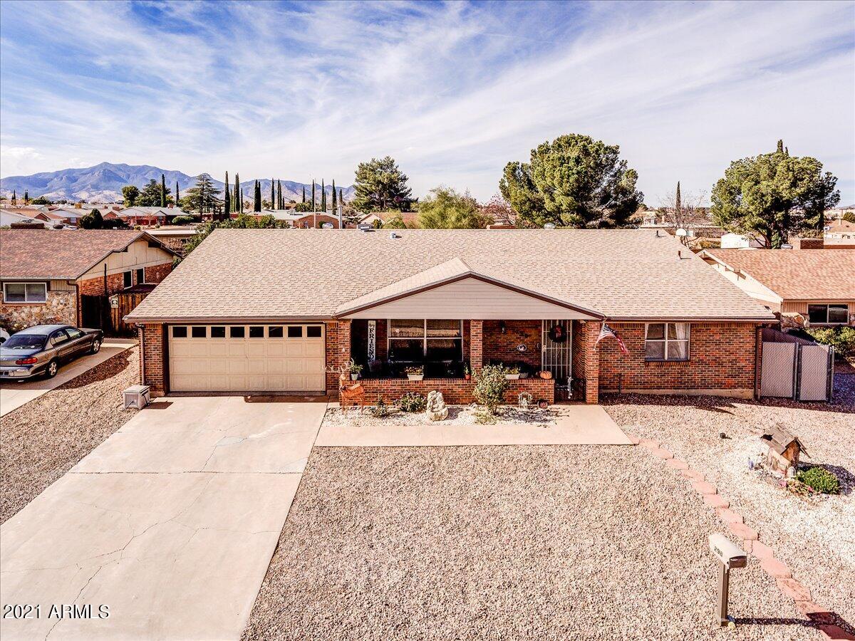 Beautiful home with large yard in town! 4 bedrooms 2 bathrooms split floor plan. Bedroom with a built in Murphy bed perfect for an office and space for your guests. Finished AZ room adds square footage and can be used for extra living space. Beautifully maintained back yard with grass and separate covered patio for entertaining. Great neighborhood close to everything you need in town! Call today for your private showing.