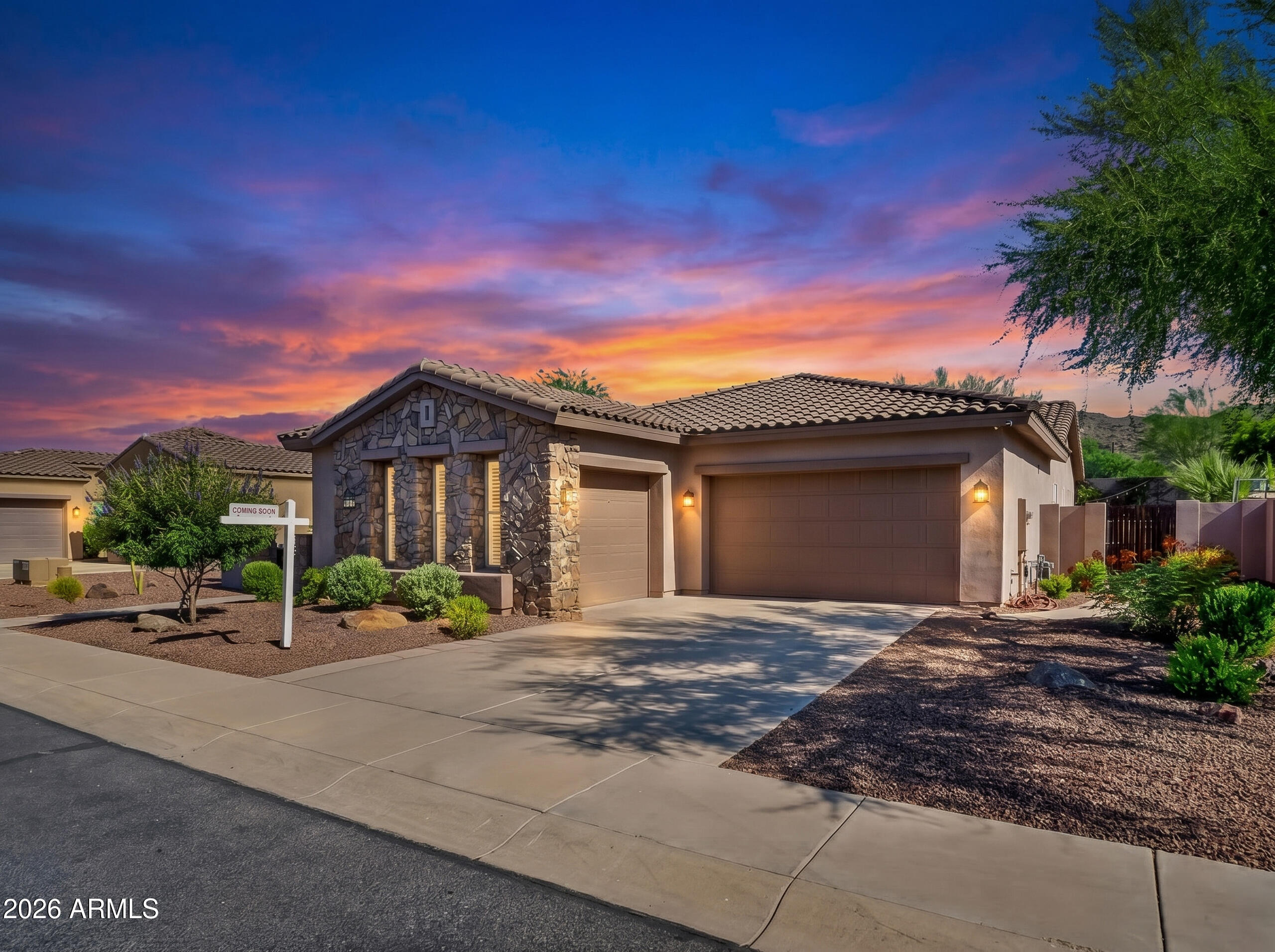 Nestled in the desirable foothills of South Mountain, this beautifully upgraded 3-bedroom, 2-bath home is a true standout. From the moment you enter, you'll appreciate the open great room floor plan, stunning Italian tile flooring, and thoughtful upgrades throughout.

The chef-inspired kitchen features granite countertops, 42'' cherry cabinetry, a large center island, oversized breakfast bar, pantry, built-in microwave, stainless steel appliances, and a gas range--perfect for entertaining and everyday living.

Additional highlights include surround sound throughout, a versatile bonus room with French doors, a granite-faced gas fireplace, central vacuum system, and a split primary suite with private access to the backyard retreat. Step outside to your own resort-style oasis complete with a spool (spa + pool), fire pit, covered patio, Kichler landscape lighting, and a gas stub for your BBQ. Ample storage throughout the home and garage adds even more functionality.