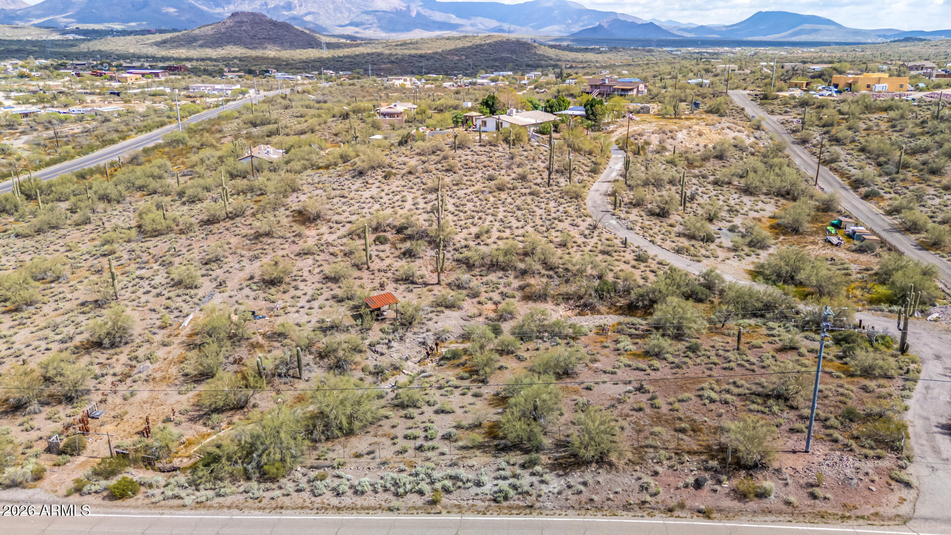 Experience the beauty of the Sonoran Desert with the convenience of easy access from this 2.7-acre New River homesite! The property already features an established driveway, capped well, and power at the lot--making it an ideal setting to build your dream home. Enjoy sweeping 180+ degree views of the surrounding mountain ranges, including the iconic Gavilan Peak. A natural arroyo and wildlife corridor along the property creates a scenic buffer from 27th Avenue while enhancing the peaceful desert setting. Only 5 minutes from I-17 and all on asphalt.