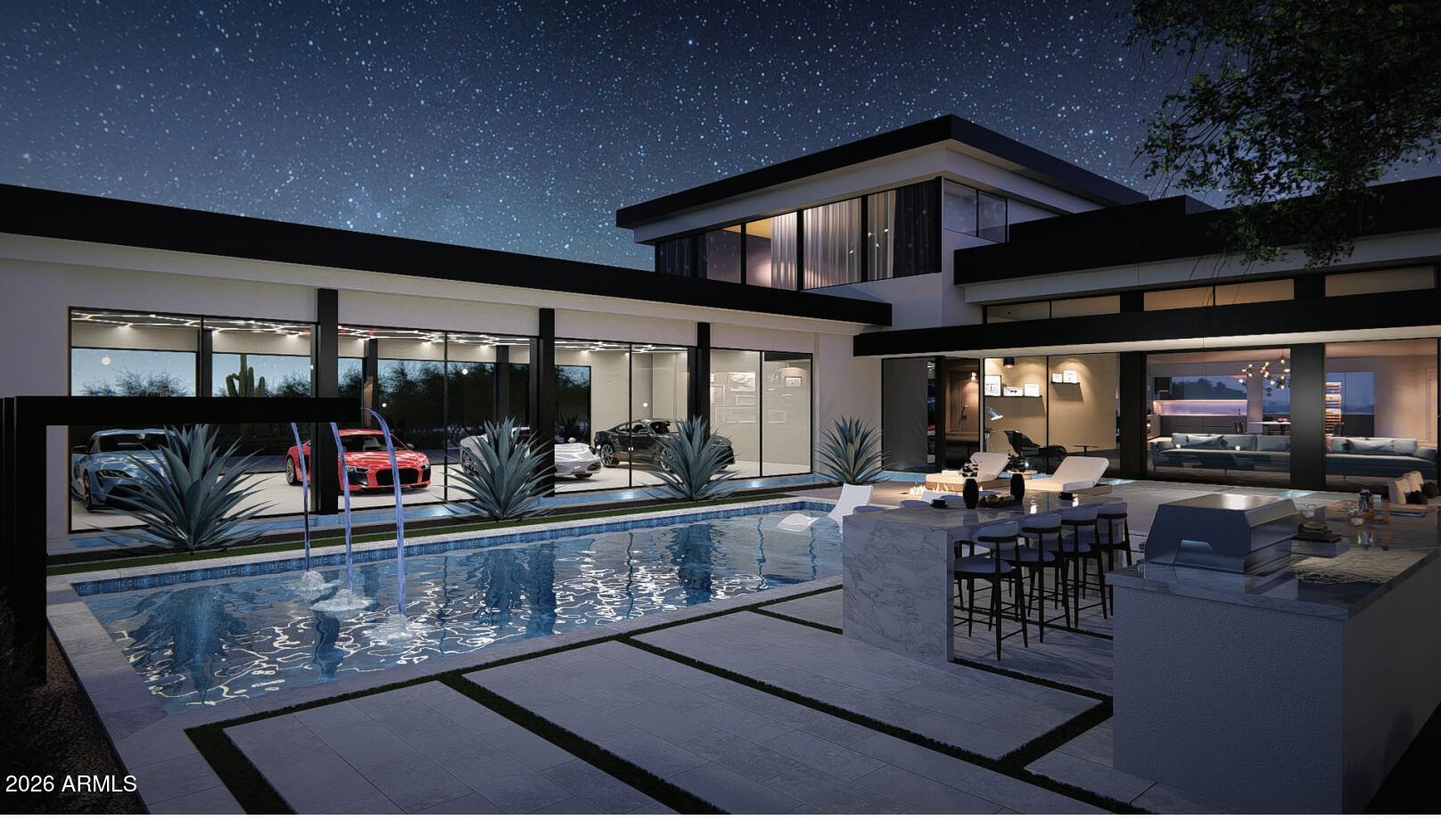 Significant Price Adjustment!  Set on a generous lot with no HOA and just minutes from all that North Scottsdale has to offer, this architecturally stunning glass residence is designed to impress. Walls of glass frame breathtaking views from every room, showcasing Pinnacle Peak and Troon Mountain.  Sweeping city lights and annual firework displays are best enjoyed from the rooftop deck, complete with its own hot tub.  The primary suite offers a spa-like retreat with a built-in sauna and an oversized dual-headed shower. A dramatic, lighted water feature flows around the entry and embraces the rear of the home, where a tranquil lounge pool seamlessly integrates with the modern design, leaving ample room for a future full-size pool.
A separate attached oversized two-car garage, tall enough for lifts and complemented by 300 square feet of storage rooms, adds organization and versatility to this exceptional home. 

Please do not enter the driveway without prior approval from Listing Agents. This home is occupied.