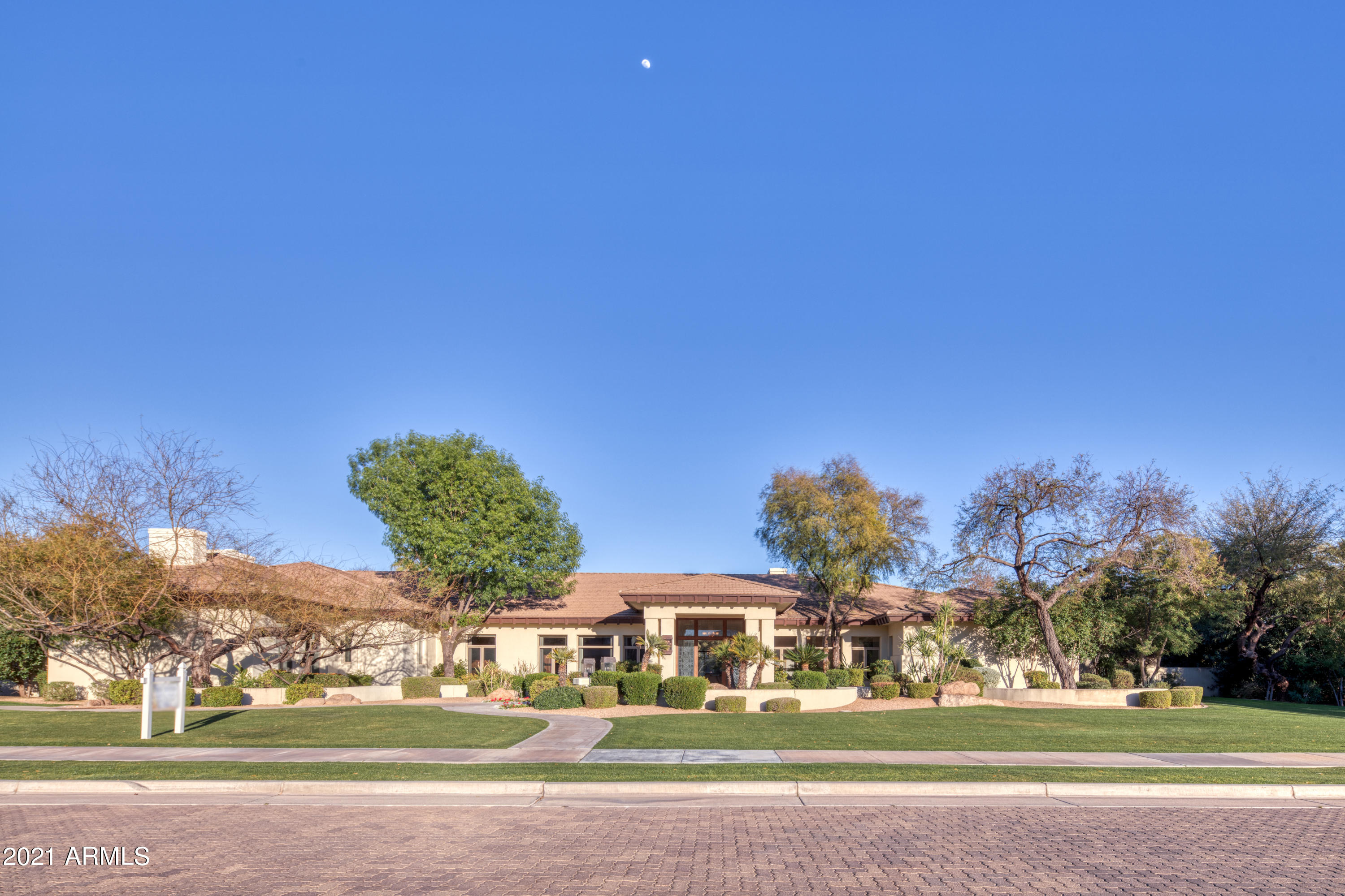 2 ACRE Transitional Contemporary with incredible Curb Appeal + Lush Green Landscaping in Privately GATED El Maro Estates, which consists of 18 Elegant Custom Homes on Large Lots! All rooms in this 8,200+ sqft Single-Level residence are over-sized + have extremely high ceilings. The home has a Large Master Suite with 2 FULL Bathrooms, 4 Spacious Guest En Suites, a Gorgeous Wood-Paneled Office, Formal Dining, Huge Family + Living Rooms + Wet Bar with Wine Closet. The 2 ACRE property has beautiful grounds with Huge grass lawns, mature trees, extensive covered patios + sparkling pool+spa. There is PLENTY of room for a TENNIS COURT, a Guest House or More Garages! Quality Construction by Notable Builder, Dave Hanson, who is known to have built homes for some of the most affluent residents of PV.