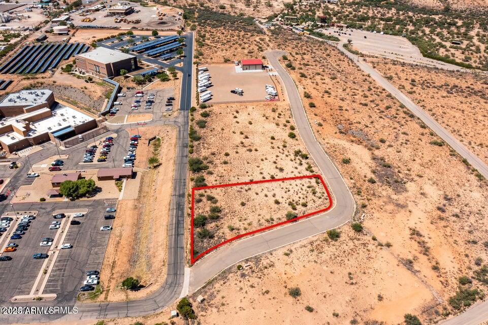 Discover an unparalleled investment opportunity nestled within the thriving complex along the coveted 260 corridor. This commercial lot boasts coveted C3 zoning, offering a versatile canvas for a multitude of ventures. With essential utilities including water, natural gas, and electricity readily accessible, realize your vision effortlessly. While the sewer expansion project awaits funding, seize this prime opportunity to secure your stake in a burgeoning locale poised for exponential growth.
