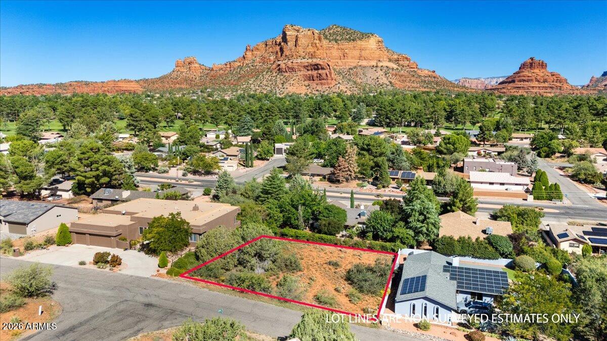 Gorgeous quarter-acre property in Sedona's Village of Oak Creek with amazing northern views of Bell Rock, Cathedral Rock and Courthouse Butte. In a quiet area of Sedona, Village of Oak Creek is known for its relaxed atmosphere, dramatic red rock scenery and hiking/outdoor recreation/trails. All utilities are available at the street. This is a dark sky community, and the Starlight Way lives up to its name! Come and check out one of the last, easily buildable lots in beautiful Sedona.