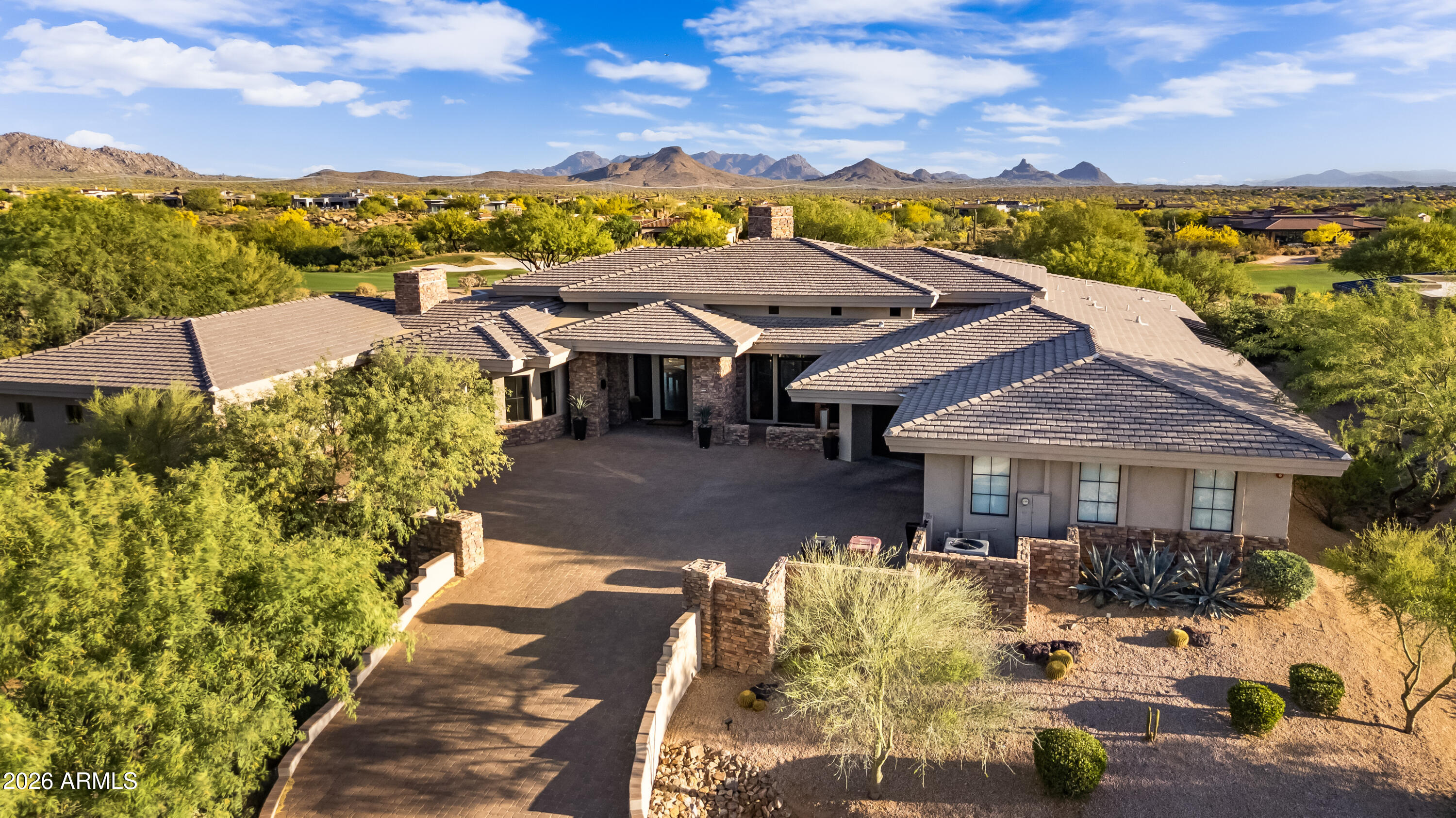 Perched on One of the Most Coveted Lots in all of Mirabel, this Stunning Scottsdale Residence Blends Luxury, Comfort, and Effortless Desert Living. Overlooking the 17th Fairway, the Home Captures Sweeping Golf Course and Mountain Views from Nearly Every Room--Anchored by a Dramatic Wall of Glass that Opens Fully to Merge Indoor and Outdoor Entertaining Spaces.

Step Outside to a Spacious View Deck/Private Elevated Putting Green, Surrounded by Lush Desert Landscaping Designed for Low Maintenance Elegance. The Centerpiece is a Negative-Edge Pool that Visually Spills into the Fairway Beyond, Creating a Serene Resort-Style Atmosphere.

Inside, the Freshly Renovated Kitchen Features Top-Tier Wolf, Sub-Zero, & Bosch Appliances, Ideal for both Casual Meals & Elegant Gatherings. The Home also Boasts Three Brand-New A/C Units, Ensuring Comfort Year-Round.

Located in One of Scottsdale's Most Desirable Golf Course Communities, and Just Minutes from the Charm of Cave Creek and Carefree, this Property Perfectly Combines Sophistication, Privacy, and the Quintessential Arizona Lifestyle.