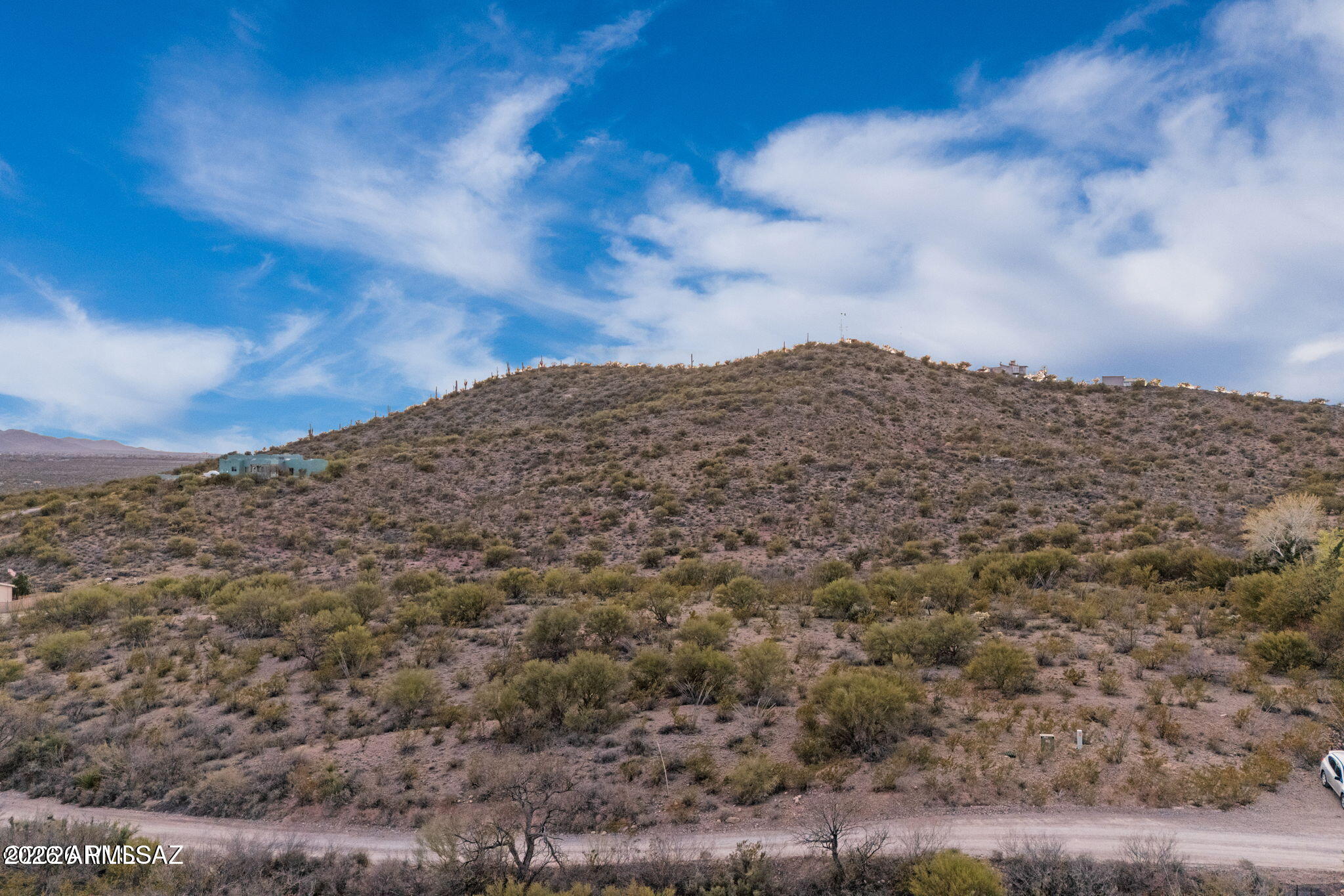 Discover the perfect canvas for your desert escape in the Rincon Mountains. This beautiful 4.49 acre lot offers a rare blend of privacy and potential, with ample space to build exactly what you envision. Featuring electricity and a shared well, the property is ready for building. Surrounded by natural beauty and open skies, you'll enjoy the peaceful setting that offers convenient access to nearby amenities, top-rated Vail School District schools, and major roadways. With no HOA, horse friendly zoning, and panoramic views, this land presents endless possibilities in a growing and desirable area.