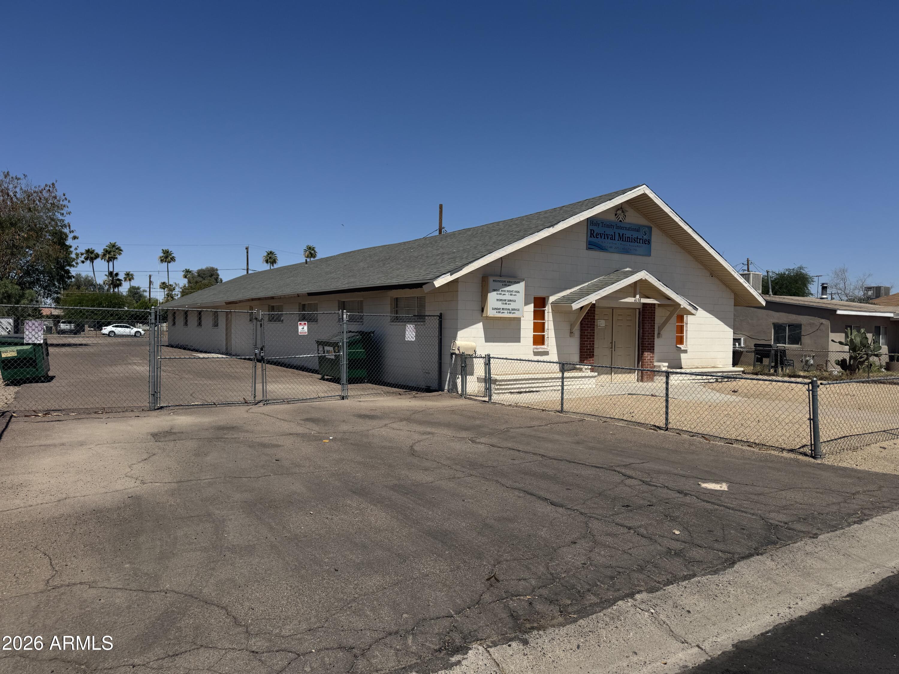 Incredible opportunity to purchase this fantastic church building just over 4500 sq ft with brand new roof, nice sanctuary, baptismal, 5 classrooms and full kitchen with dining area. Building also has 4 bathrooms. This purchase also comes with the vacant lot adjacent to the South currently zoned R-3. Owner had preliminary plans to build 5 residential units on this lots. You could expand your church with the extra space or combine both lots and re-zone with potential of 8-10 new dwelling units on the over 25,000 sq ft combined.