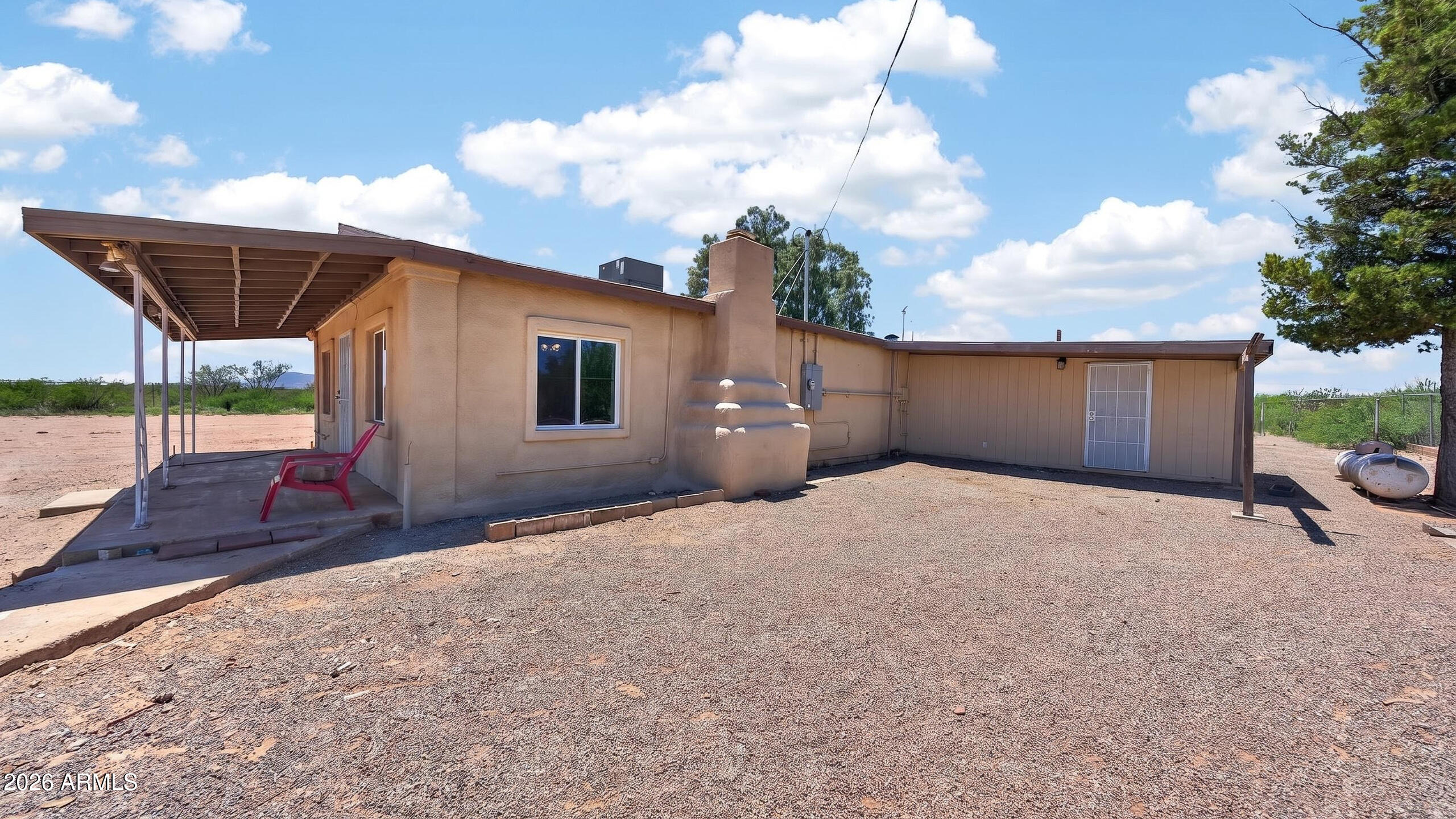 Charming 1951 home situated on 3 acres of horse property with endless potential! This 3-bedroom home features updates throughout, including tile flooring, updated fixtures, newer countertops, and more. The property includes a private well and newer septic system for added value and convenience. With plenty of open space, this oversized property offers incredible opportunities for expansion, additional structures, horse facilities, or creating your own private retreat. Enjoy country living with room to grow!