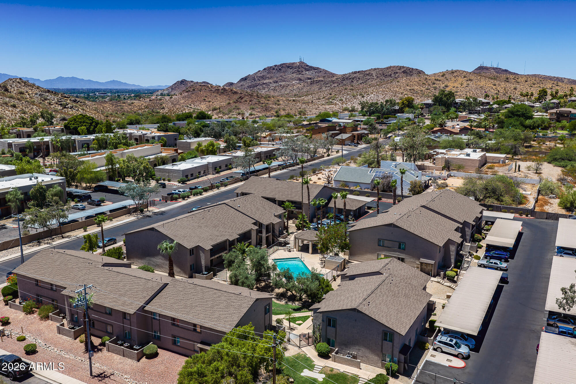 Welcome to 12440 N 20TH ST 220, Phoenix, AZ 85022. This fully updated 3-bedroom, 2-bathroom condo in the gated Shamrock Glen community delivers a move in ready experience. 
At 972 sq ft, this second-floor end unit overlooks the community pool and features a practical layout with three generously sized bedrooms. The 2023 full remodel includes new Luxury Vinyl Plank flooring throughout (no carpet), fresh interior paint, granite countertops, stainless steel appliances, and an in-unit washer/dryer. Additional conveniences include a private front patio with extra storage and an assigned covered parking space. Residents enjoy the community's gated entry, built in BBQs, and sparkling pool.
Location built for convenience. Quick access to I-17 and SR-51 makes commuting across the Valley efficient in either direction. Sky Harbor International Airport sits roughly 25 minutes away. Convenient routes reach Grand Canyon University, Paradise Valley shopping and dining, Moon Valley amenities, and nearby public transit options.
This rare 3-bedroom condo at this price point in an updated, low-maintenance gated setting checks the boxes for buyers who want modern condition and strong location benefits.
