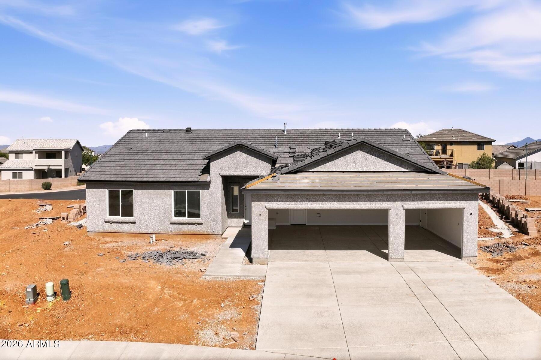 New construction in Estates II of the Holiday Subdivision! This energy efficient 1,904 sq.ft. Walston home offers 4 bedrooms and 2 bathrooms, with a stylish modern layout. Enjoy a spacious living area, dining nook, and a gorgeous kitchen featuring dark wood cabinetry, quartz countertops, pantry and stainless steel appliances. The generous primary bedroom offers a walk-in closet and ensuite bath with dual vanity, tile shower and separate tub. Three additional bedrooms provide comfortable space and natural light. Enjoy indoor laundry, a 3-car garage with exterior access, plus a covered patio for outdoor enjoyment. Walking distance to community pools, playgrounds, an activity center, and extensive biking and hiking paths. All just minutes from downtown shopping, restaurants, and Ft. Huachuca!