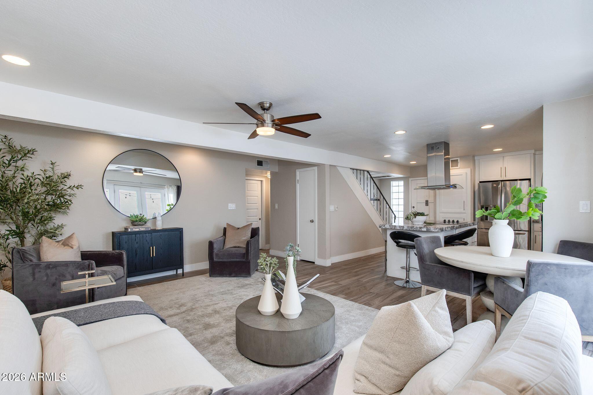 Experience effortless Scottsdale living in this beautifully updated townhome featuring a bright, open floor plan with designer finishes throughout. The remodeled kitchen offers modern cabinetry, sleek countertops, stainless steel appliances, and flows seamlessly into the living and dining areas. Primary suite is on second level while two rooms and bath complement the main level. Abundant natural light throughout creates an inviting feel, while the private patio is ideal for relaxing outdoors. Enjoy access to the community pool and a low-maintenance, lock-and-leave lifestyle. Just minutes from Old Town Scottsdale, Fashion Square, golf, dining, shopping, spring training, and Loop 101, this home offers the perfect blend of style, comfort, and convenience.