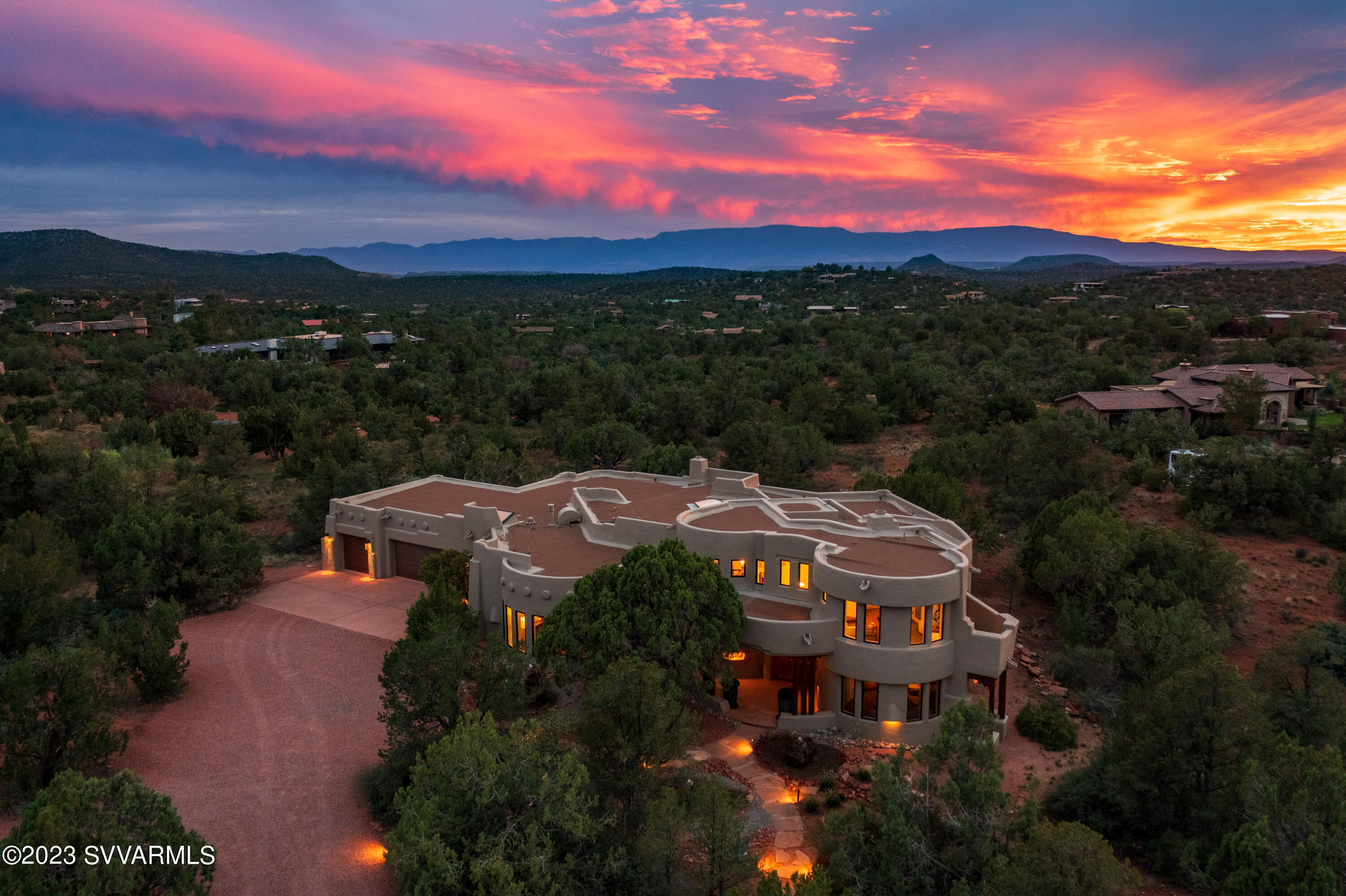 Land, Privacy, and Proximity. Welcome home to 55 Camino Del Caballo. This exquisite residence sits on 2.47 acres of land and is minutes from the heart of West Sedona, Enchantment, and Seven Canyons.

The Dry Creek / Camino Del Caballo corner location gives this architectural residence unstoppable and unblockable views of Bear, Cockscomb, Doe, Boynton Canyon, Thunder Mountain, and the Mogollon Rim. Remodeled throughout, this fresh property is what Sedona life is about. Elevated—gated security and a long drive leading to the estate's water garden entry. THREE car garage, Three Bedrooms with Two office spaces. Five bathrooms (2 Full/3 Powder) sunset patio and an enclosed courtyard for your guests, family, or children.

The entire furniture package is available for purchase.