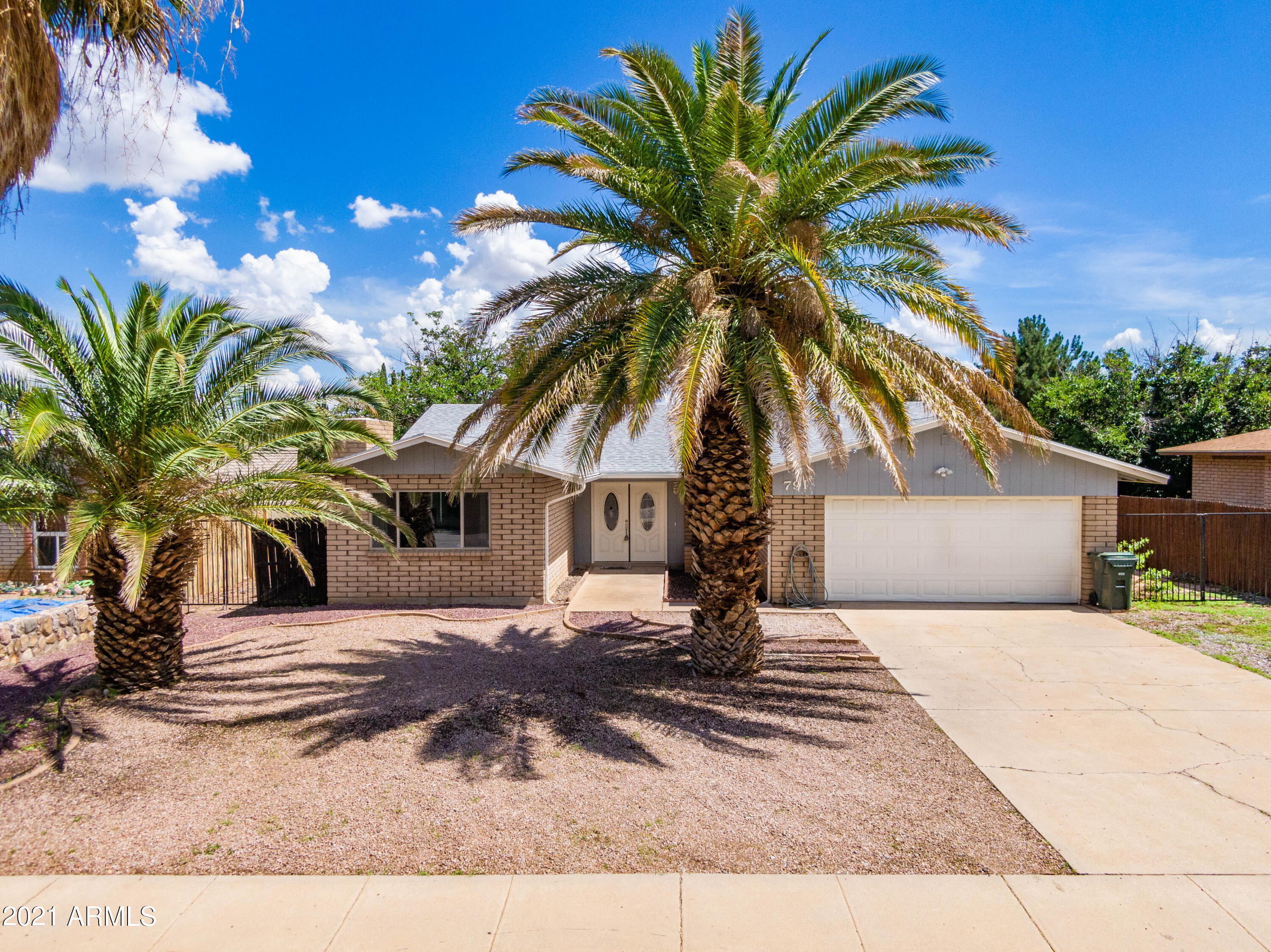 Beautiful remodeled 4 bedroom/2 bathroom home.  Living room is designed for comfort and style with a fireplace and big window. Spacious Arizona room perfect for a extra sitting, dining or game room. Split floor plan makes this home for any stage of your needs. Sitting on an extra large lot with a private backyard no rear neighbors. 2 car garage. You will want to see this one in person.