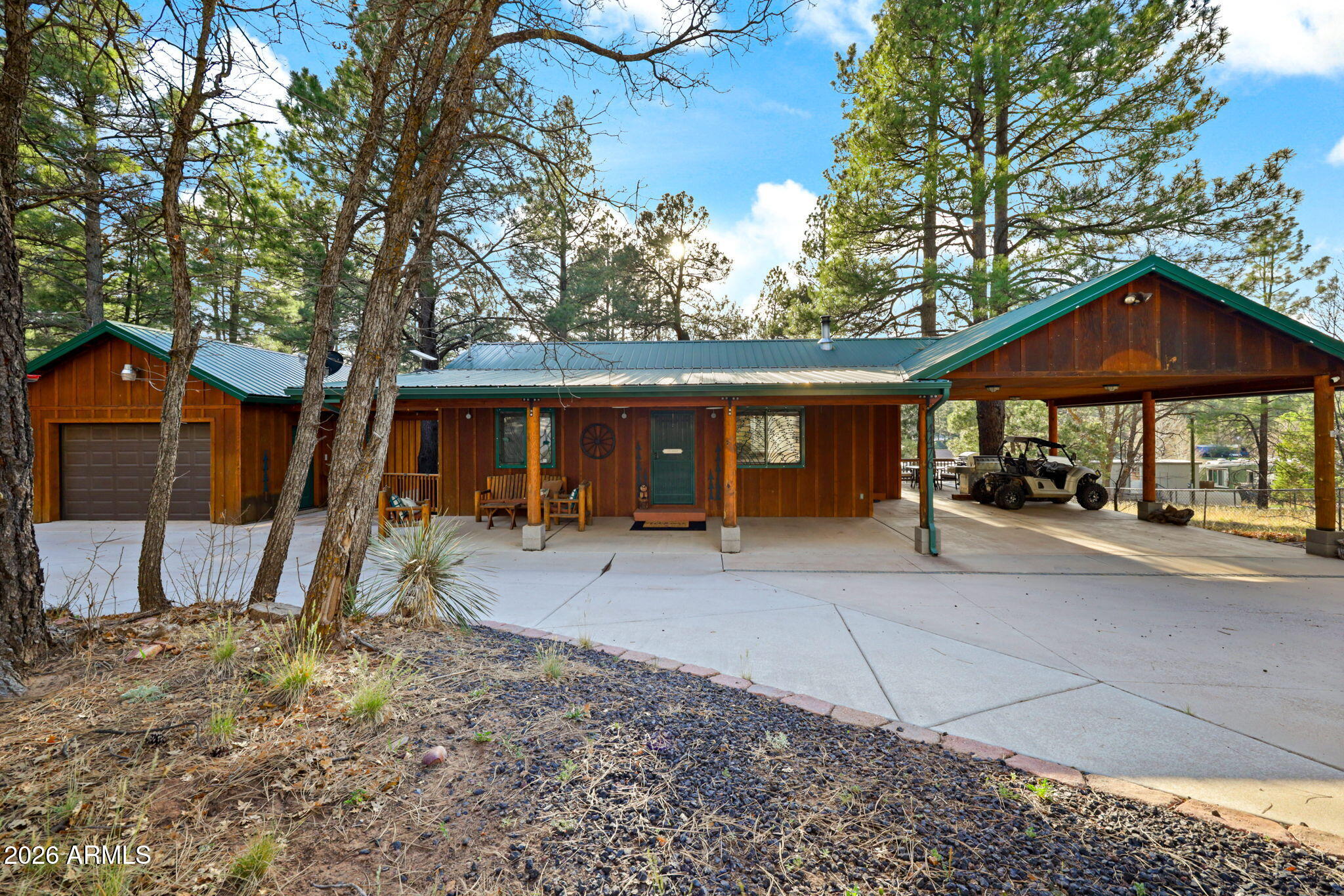 Escape to the cool mountain air and discover your private retreat in beautiful Show Low, located in the peaceful Summer Pines community. 🌲🏡 Nestled among towering pines on a spacious half-acre lot, this unique property offers the perfect blend of serenity, flexibility, and income potential. The property features a charming 1-bedroom main home, a detached garage, and a private guest casita--ideal for hosting family and friends or creating a sought-after seasonal rental. Situated directly across from the National Forest, outdoor adventure and scenic beauty are right outside your door. Enjoy true freedom with no HOA, a fully fenced yard with power gates for privacy, and RV-ready convenience with 30-amp service in the garage.

Whether you're searching for a peaceful getaway, investment opportunity, or fully furnished mountain escape ready to enjoy from day one--this Summer Pines oasis delivers it all.