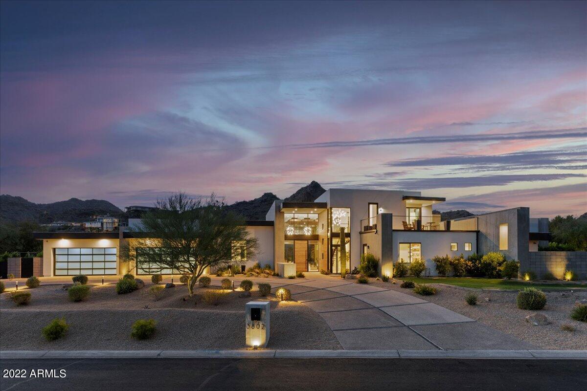 A modern escape - one only found in the heart of Paradise Valley. From the moment you approach the estate, you're drawn in through the stunning floor to ceiling walls of glass inviting you into a gorgeous great room with sweeping views of Piestewa Mountains. 6,600 sq ft of beautifully appointed interiors complimented by another ~2,000 sq ft of exterior under roof creating the perfect indoor / outdoor living experience. Thoughtful upgrades & custom finishes throughout - truly turn key. A completely reimagined yard finished in 2022 - breathtaking landscaping, lush vegetable gardens, wood fired pizza oven and a 60' saltwater pool/spa with 20+' baja shelf for pure relaxation. A short walk to PCDS, Chelsea's, LGO and many more. One of a kind - you won't find another like it, welcome home.