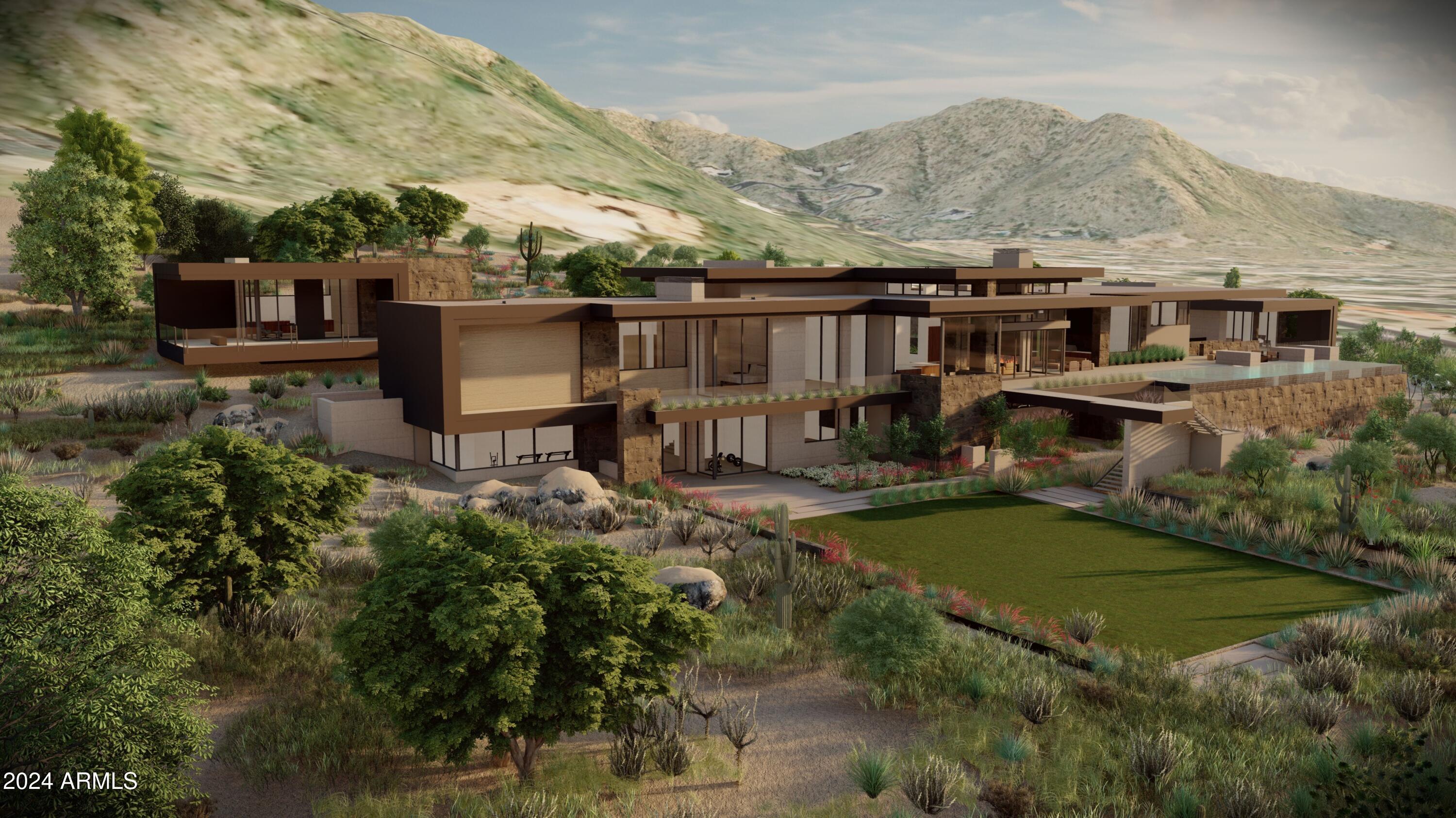 This 3.83 acres of vacant land is a beautiful property that contains 2 contiguous lots. It has an extremely large flat area as you can see from the photos, although the property is considered hillside per the town of PV. Renowned Architect, CP Drewitt and the owners have spent over 1 year designing a stunning contemporary home traversing these two lots. It has passed some hillside committees but has not yet obtained a permit. With panoramic views of the McDowells, the 4 Peaks and Mummy Mountain it is a fabulous lot to build on. 
Parcels are 174-52-002-G and 
174-52-002-H.