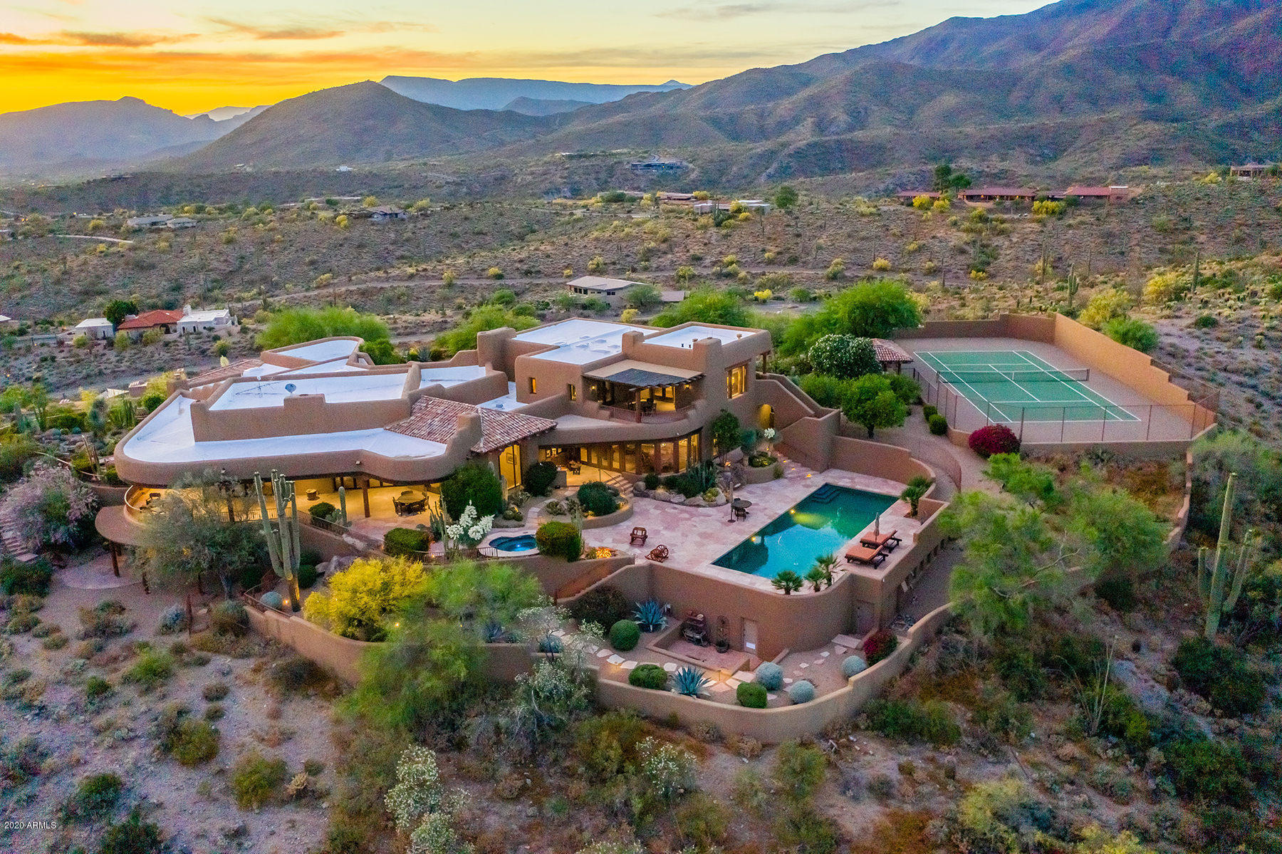 This magnificent Carefree estate was entirely re-mastered between 2014 and 2018 by the current and former owners who spent over $2.5 million on the remodel alone.  Virtually every system on the property was replaced with new; yet the architectural genius of Alan Tafoya was fully retained.  ''Custom'' does not begin to define this home.  This one-of-a-kind luxury retreat is perfectly sited on over 3 acres of Sonoran Desert Beauty at the VERY top of the Carefree hills, offering 360 degree Mountain and Sunset views.  The Savant Pro System is just one example that no expense was spared on this complete restoration allowing control of the entire house (TV, Music, HVAC, Lighting, and Security) from your phone.   For a Matterport Walkthrough, please go to Photos/Virtual Tour tab