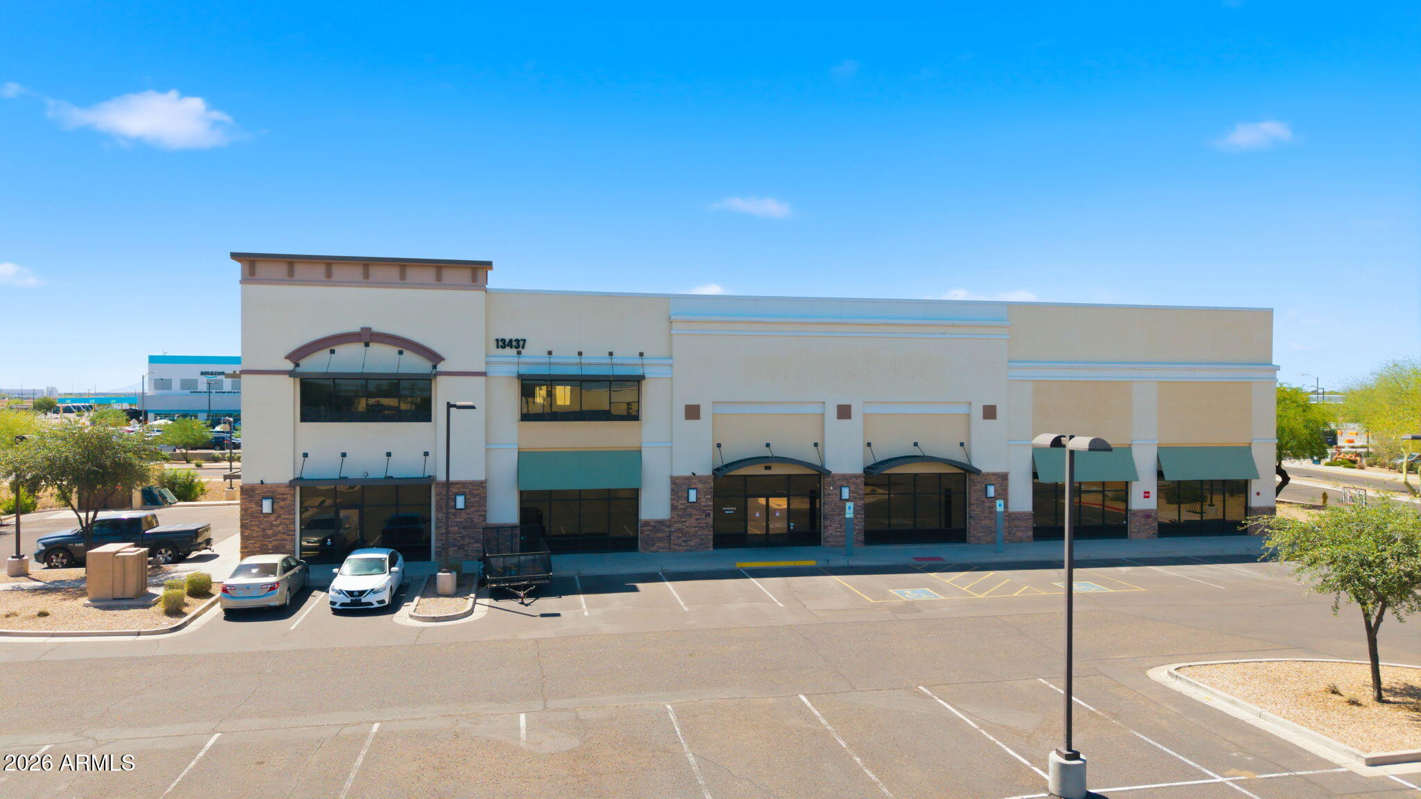 Prime commercial opportunity in Surprise, Arizona. This large commercial building, currently used as a religious facility, offers exceptional flexibility for a variety of potential uses. Featuring expansive interior space with clear heights ranging from 12' to 25', the property may be well suited for continued assembly use, a gym, event center, or other commercial applications. Excellent location in a growing area with strong accessibility and visibility.