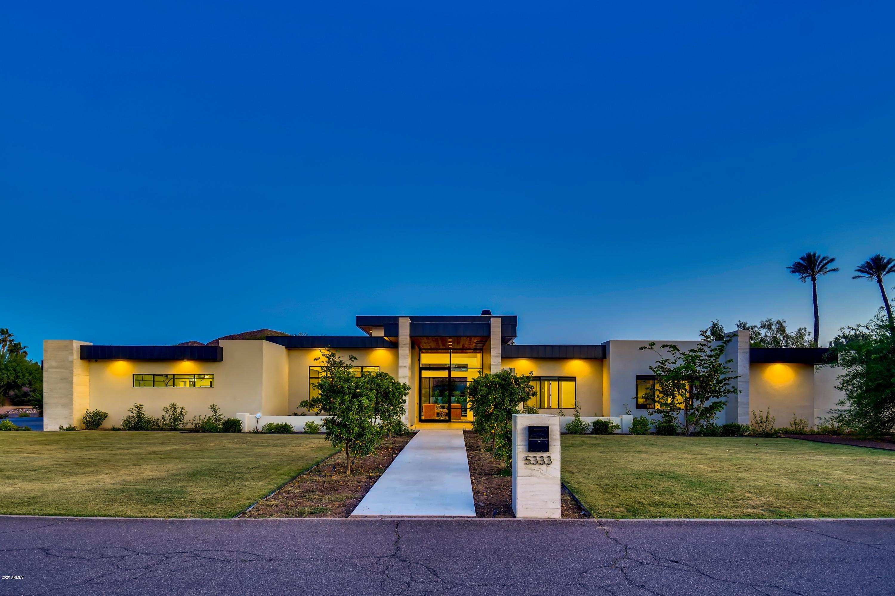 Modern masterpiece offers an open floor plan that includes 5 bedrooms, 5 full bathrooms, 1 powder room, and a 5-car garage. Natural light pours throughout the home from the retractable walls, making this house the embodiment of indoor-outdoor living. Entertainers will be delighted by the custom wine cellar, state-of-the-art kitchen and fully equipped prep kitchen. Excellent design creates the ultimate setting for both large-scale entertaining and private enjoyment. The home offers wide plank walnut and Iberian brushed limestone floors. The over-sized Master suite encompasses a spa-like bath, spacious his/hers walk-in closets and a private gym overlooking the outdoor living area and pool. The large, outdoor patio space invites you to dine al fresco, swim in the pool or relax in the seclude