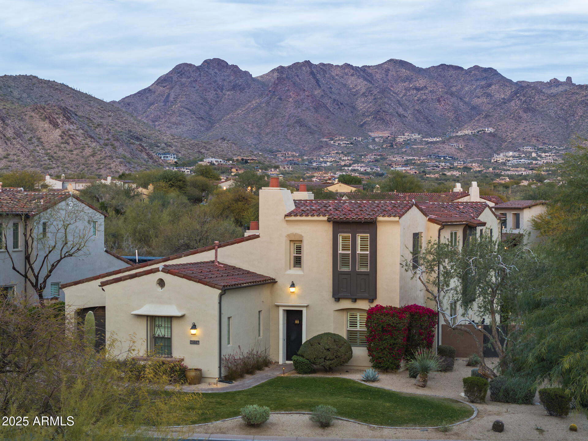 Welcome home to this fully remodeled dream Arizona property! Nestled in the prestigious Haciendas enclave of DC Ranch, this home offers an exceptional opportunity in a highly sought-after community where homes rarely come available. Set on a large corner lot, the property benefits from expansive 180-degree views of the McDowell Mountains to the north, complemented by sweeping city lights to the south. Surrounded by natural open space (NAOS), the lot feels even more spacious and private.

This highly regarded Camelot Home design boasts 4 bedrooms, 3.5 bathrooms, a large teen room, study, private courtyard, dedicated office and primary suite on the main level. Recent, high-end upgrades include European oak wood flooring, marble primary bathroom, quartz kitchen countertops, and custom white cabinetry. The gourmet kitchen is a chef's dream,
featuring top-of-the-line appliances from Thermador, Sub-Zero, and Miele.

Additional enhancements include a tankless water heater, whole-house water filtration system, water softener, three new HVAC units, and all new windows throughout. The backyard has a pool with swim up bar, spa, built-in BBQ, plenty space for outdoor activities or relaxation, surrounded by lush grass and protected by trees. The space is perfect for enjoying the Arizona outdoors.

This home is within close proximity to the newly renovated DC Ranch community center, as well as the upscale dining, shopping, and entertainment options at Market Street. Neighbors enjoy convenient access to community trails, which lead to the highly sought after Copper Ridge School. This is a rare opportunity to own a truly exceptional property in one of Scottsdale's most desirable neighborhoods.