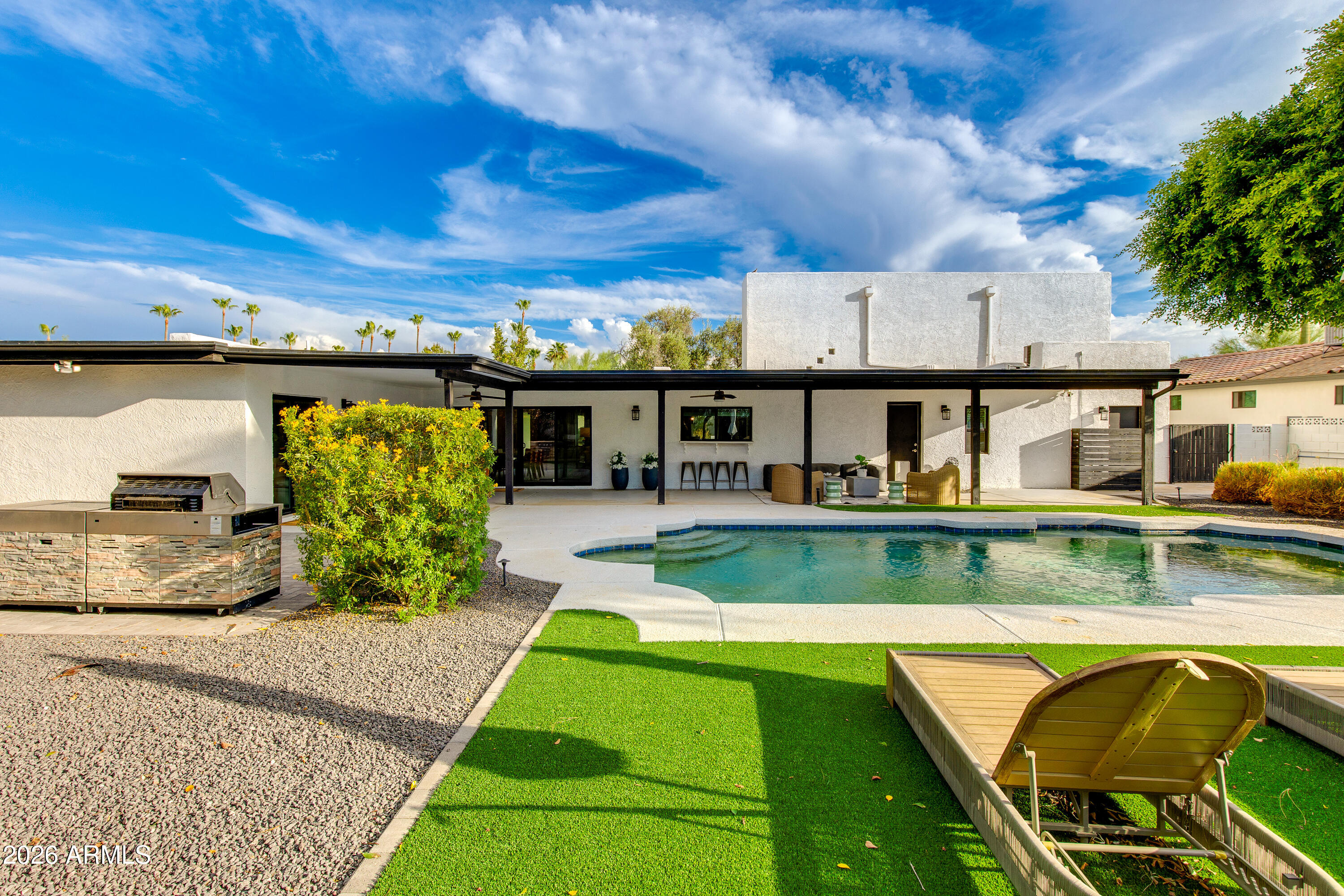 Positioned in the coveted 85254 golden zip-code and minutes from the new PV Mall developments, your new home awaits! This stunning home features an oversized lot, open floor-plan, and upgraded finishes throughout. Desirable 3-Car Garage and RV Gate, with plenty of parking for guests. This home features an expansive backyard, private pool, and lush landscaping. Primary bedrooms located downstairs and the second level features  the perfect loft for a play-room, man/woman cave, or guest suite.  Entertain in style with an outdoor putting green, fire pit, covered patio, and built in BBQ. Designer kitchen with quartz counters, wine cooler, and ample storage. Located in a charming neighborhood with TONS of new development and the chance to plant roots in Scottsdale's golden zip code.